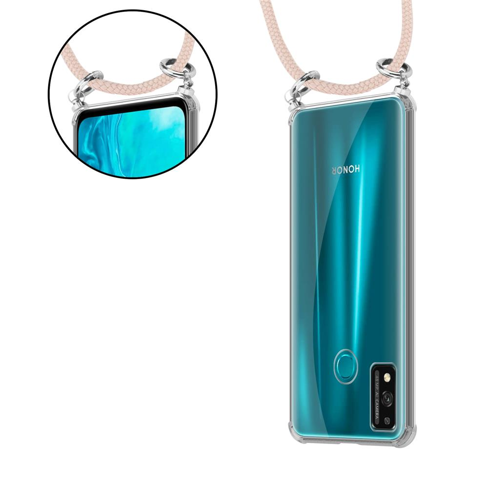 Una cover trasparente con laccetto avvolge un telefono Honor verde acqua.