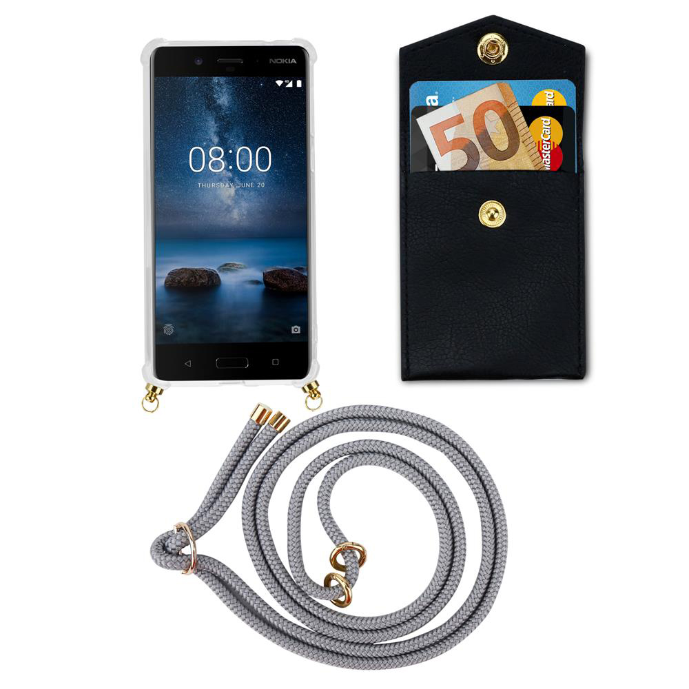 Nokia Handy mit schwarzer Brieftasche, Euroschein, Kreditkarten und Kordel.