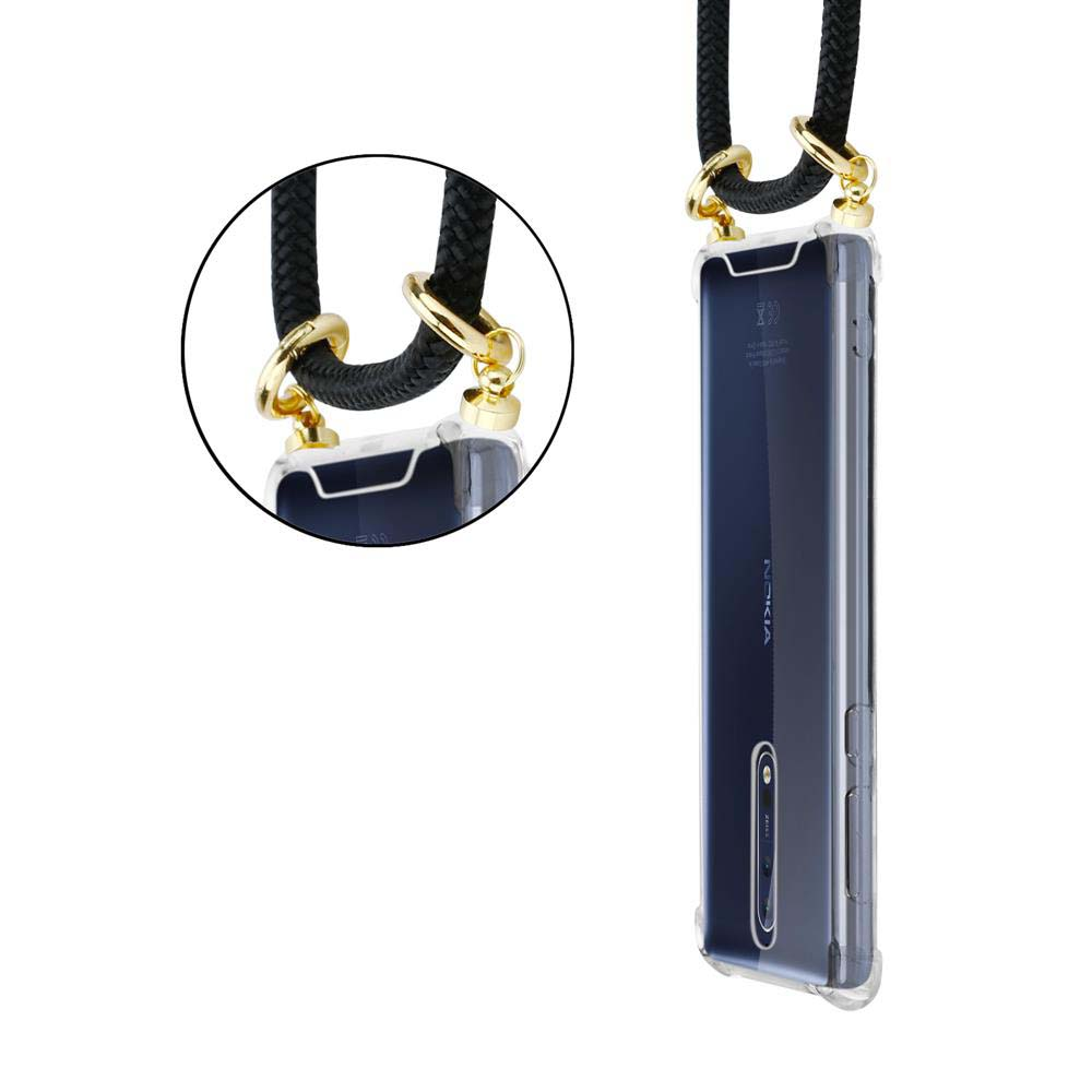 Ein durchsichtiger Handykoffer mit Schnur und goldenen Beschlägen an einem Nokia-Telefon.