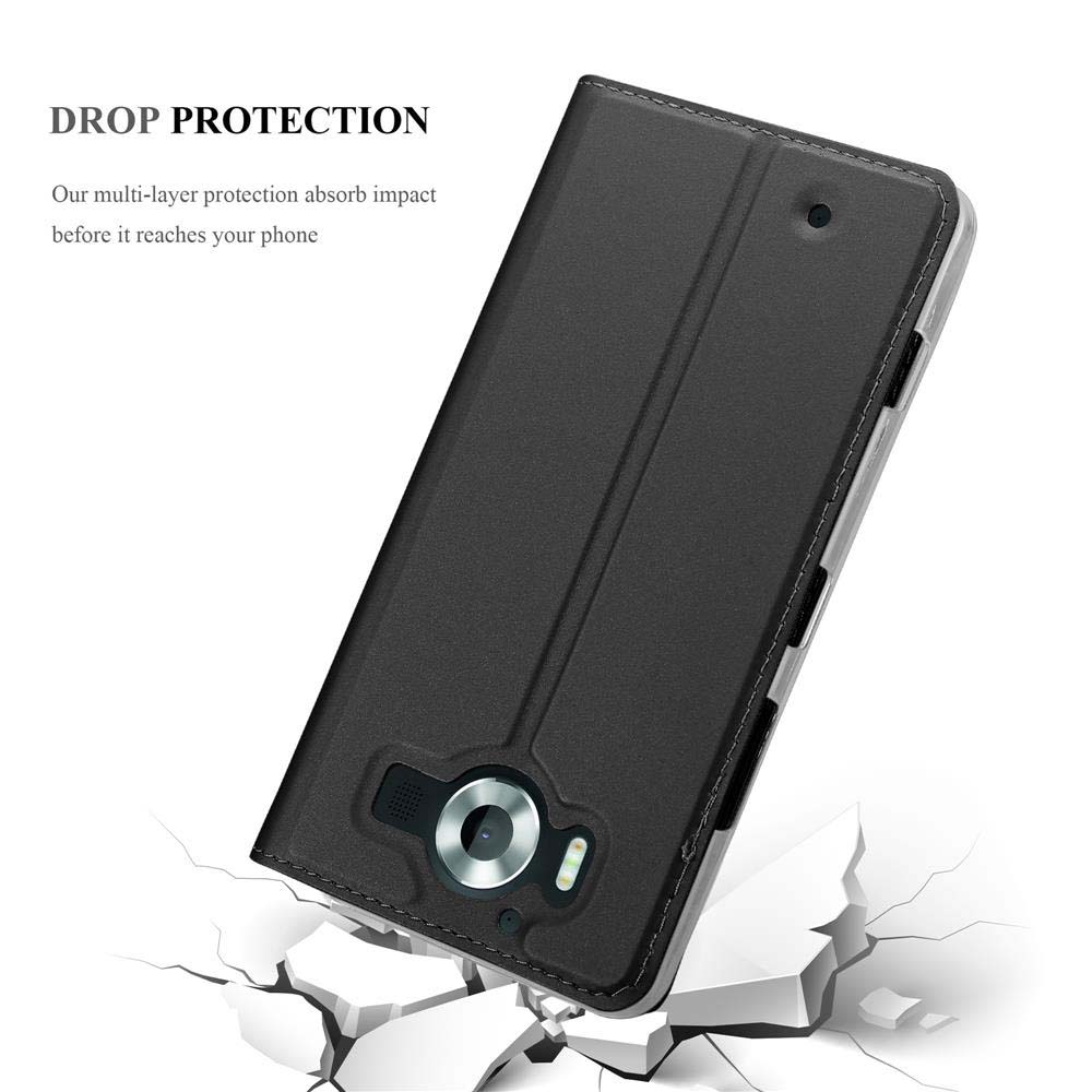 Funda de teléfono negra sobre suelo agrietado, mostrando protección anticaídas.