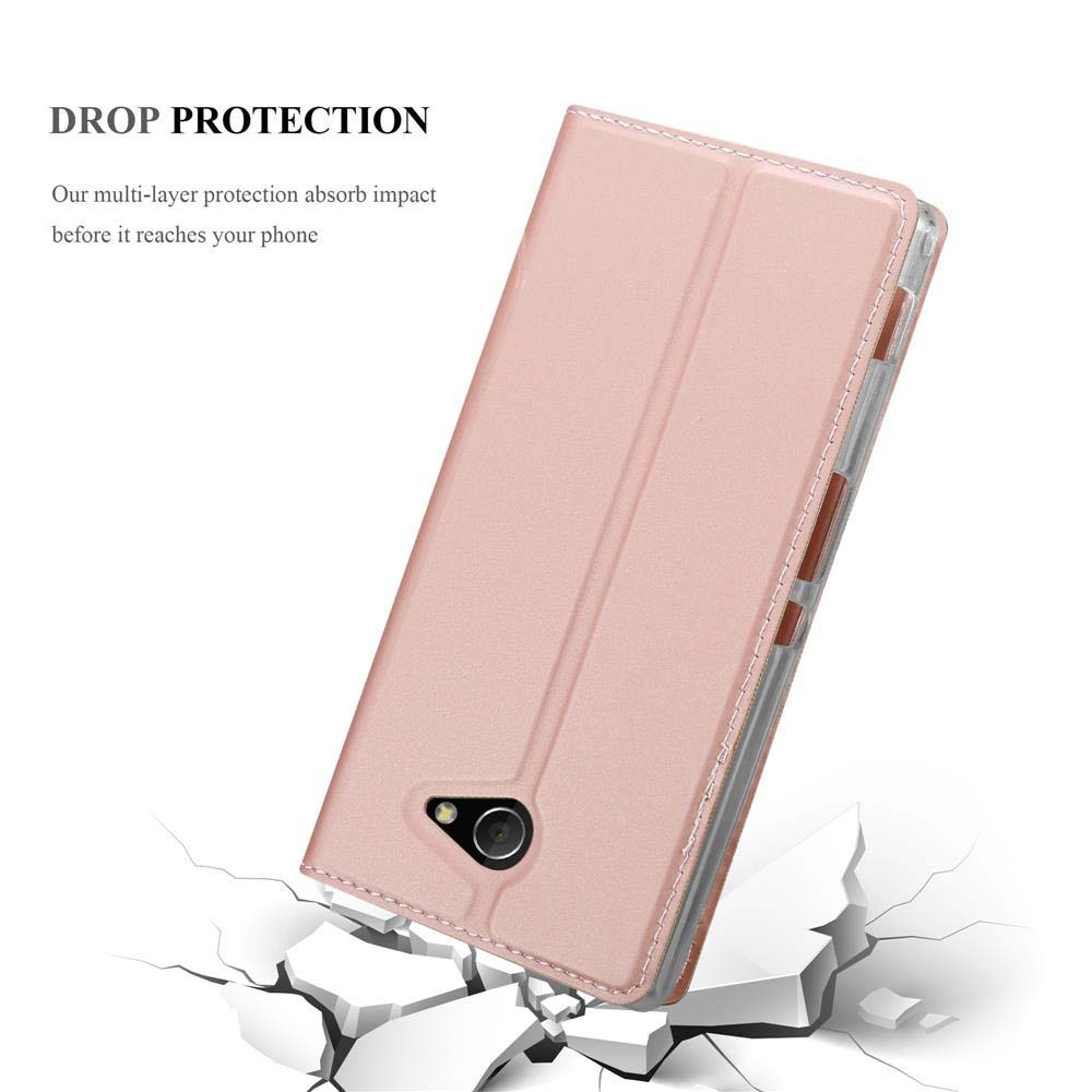 Ein rosafarbenes Handycover liegt auf zerbrochenem Boden.