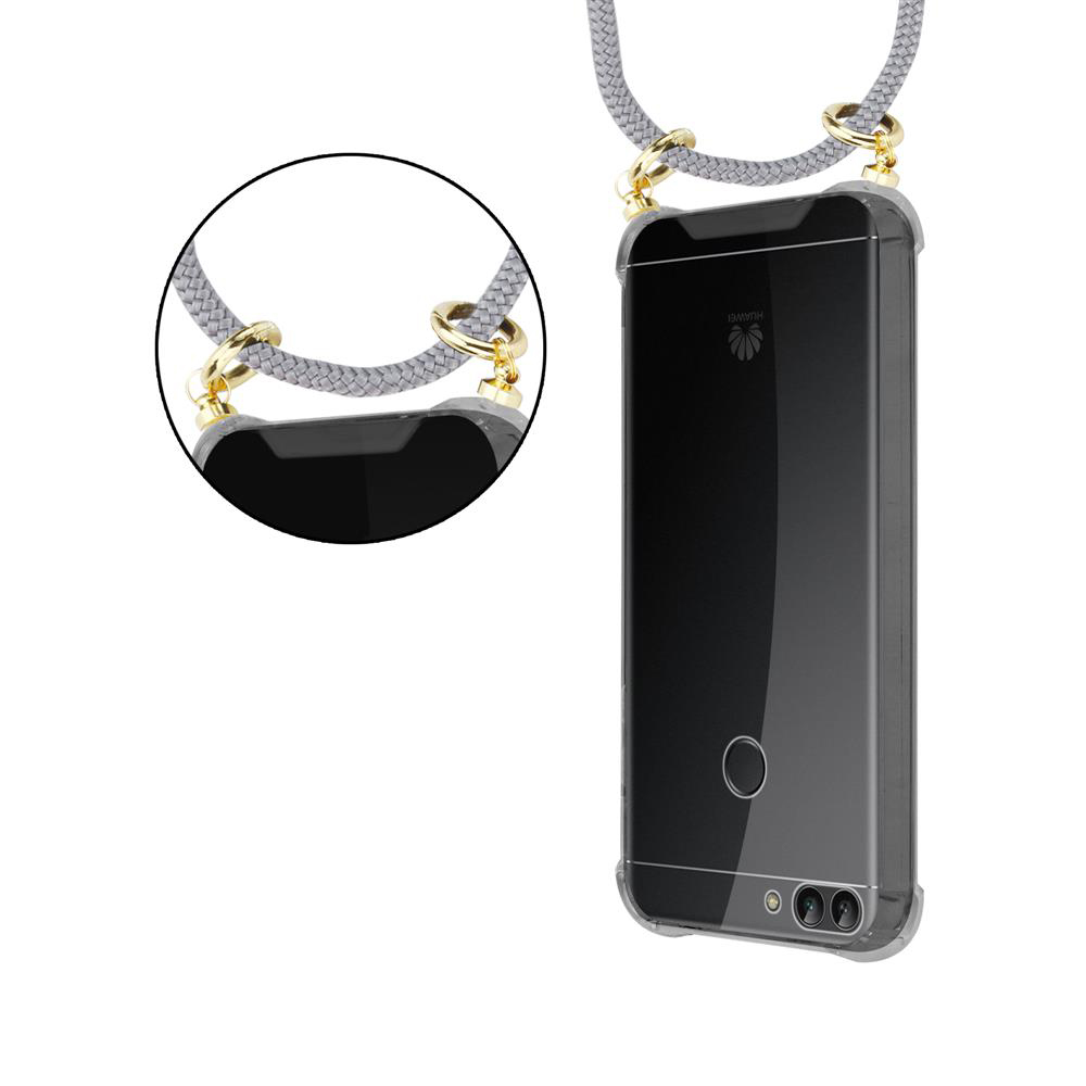 Uno smartphone nero in custodia trasparente con cinturino grigio.