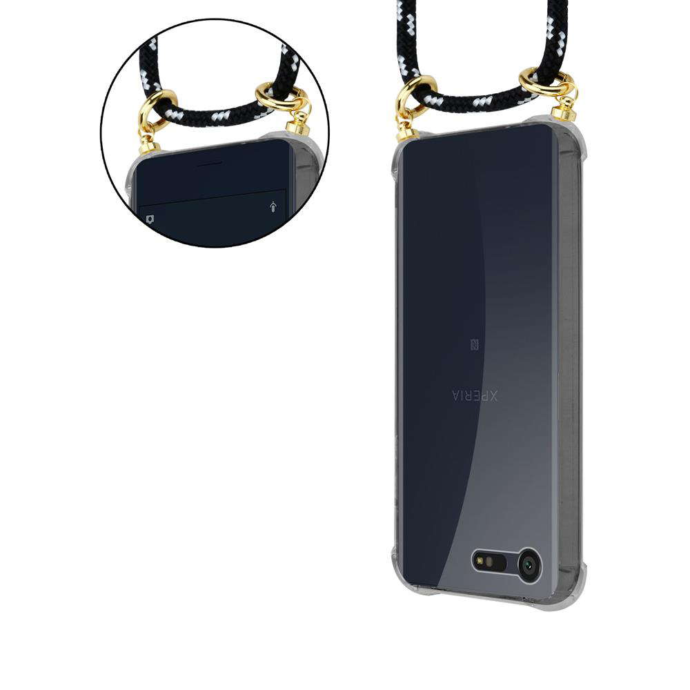 Un smartphone con funda transparente y cordón sujeto a los ojales.