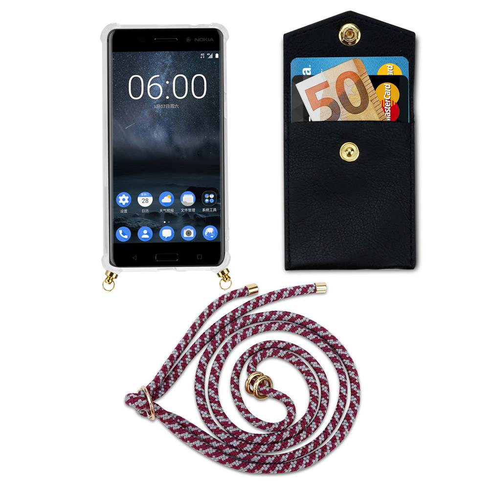 Nokia-Handy mit Hülle, Kartenetui mit Karten und Lanyard auf weißem Grund.