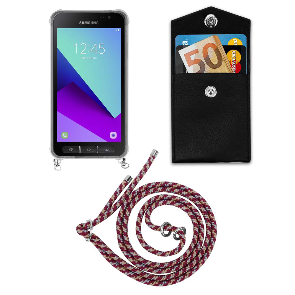 Smartphone Samsung con banconota da 50 euro, carta di credito e cordino.