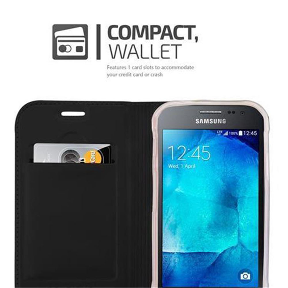 Custodia a portafoglio nera con telefono Samsung. Una carta è visibile.