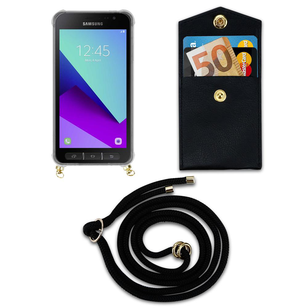 Uno smartphone Samsung in custodia trasparente, un portafoglio nero con soldi e carte, e un cordino nero.