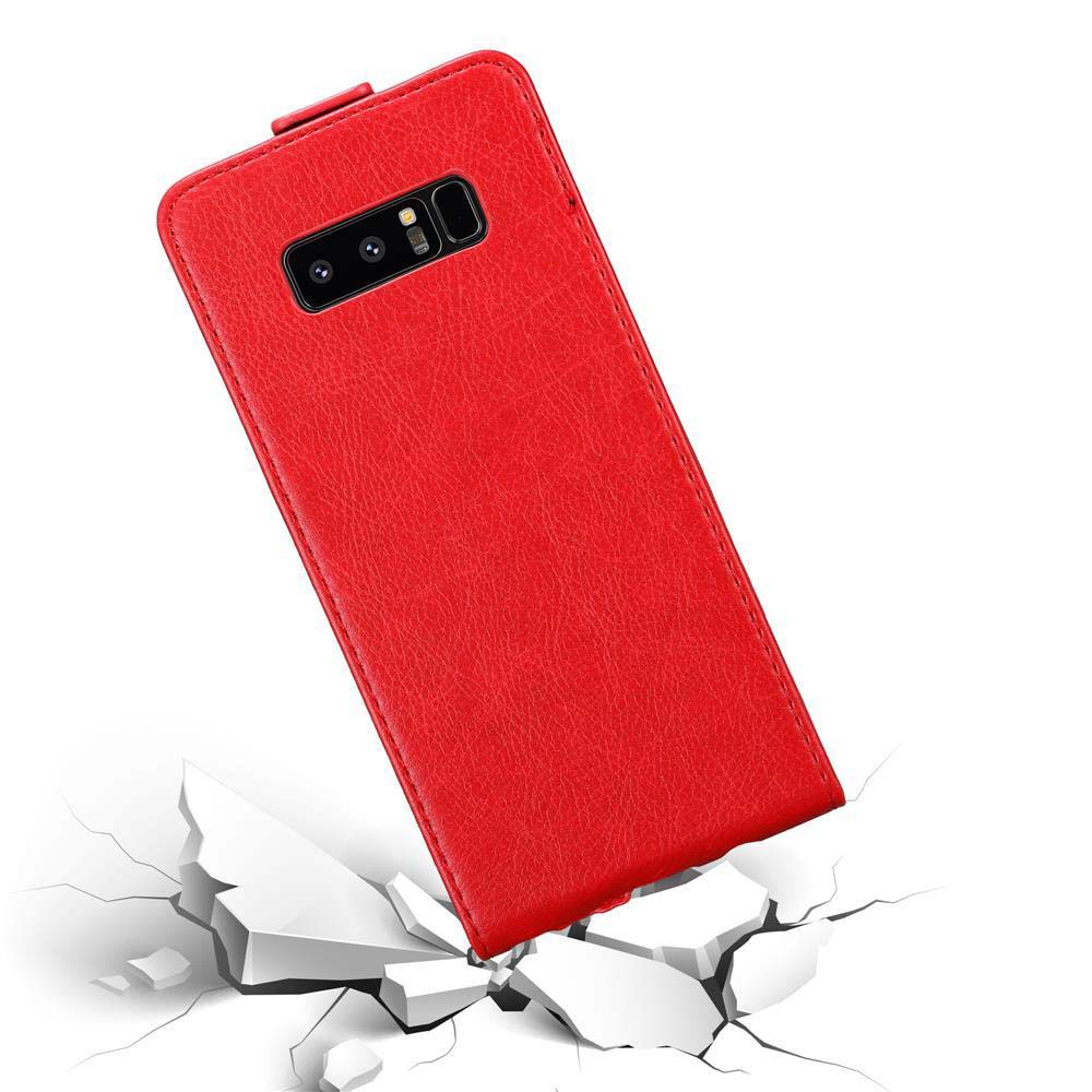 Custodia rossa per telefono che cade su superficie bianca.