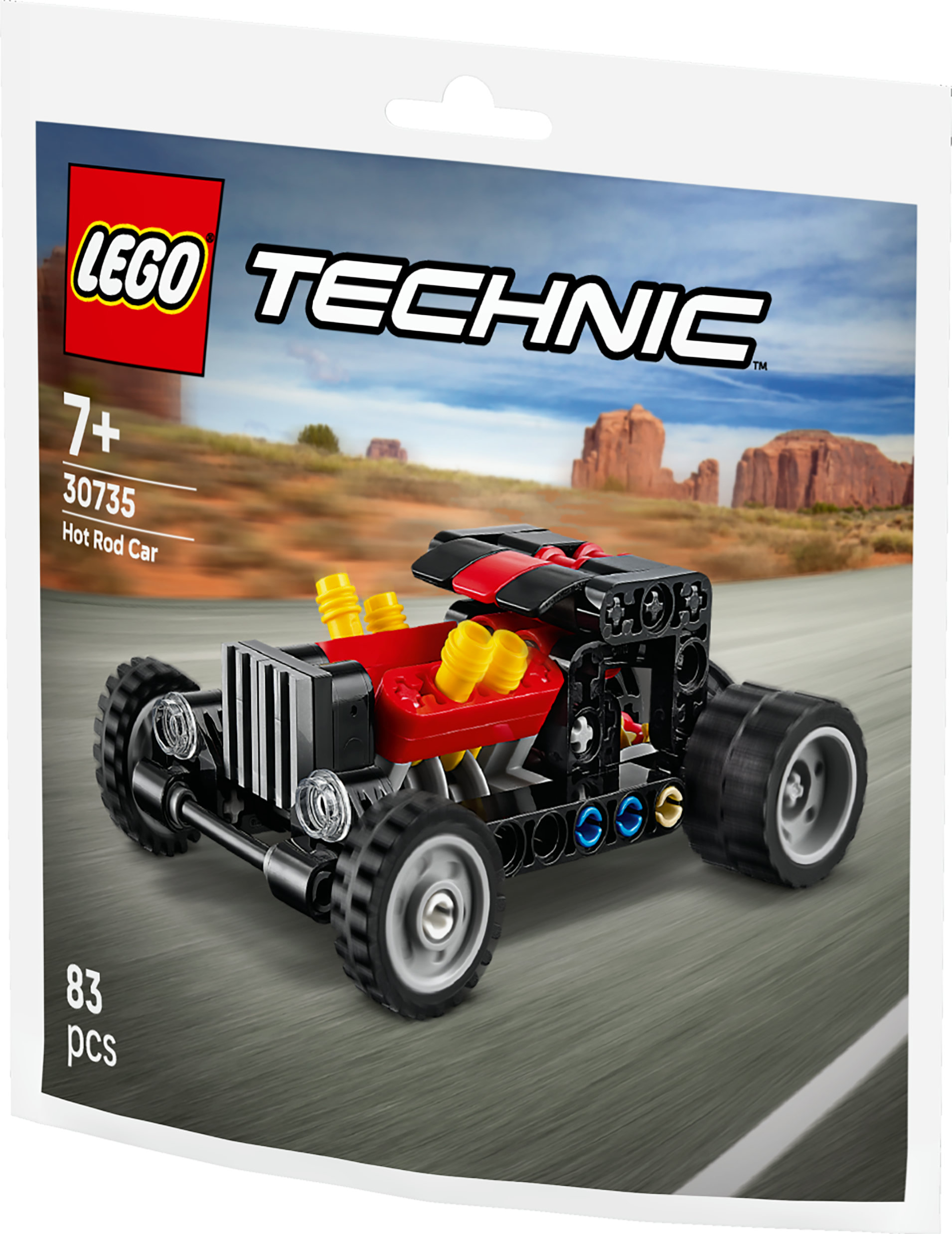 Sarı egzoz borulu kırmızı ve siyah Lego Technic hot rod bir yol üzerinde.