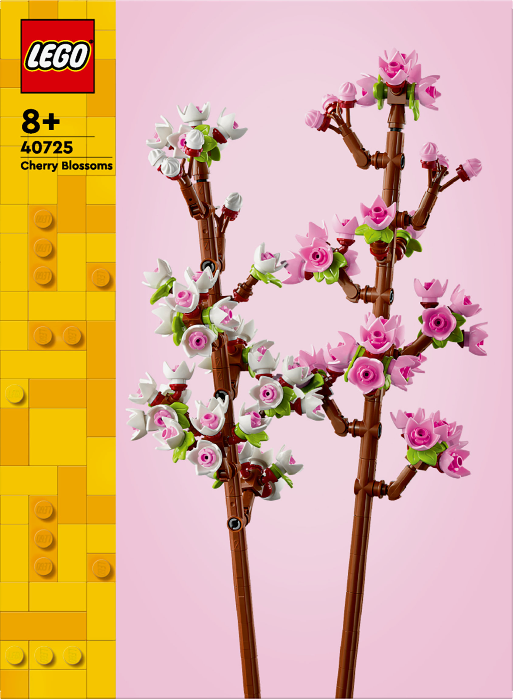 LEGO Kiraz Çiçekleri seti, kahverengi gövdeler ve pembe/beyaz çiçeklerle pembe arka planda.