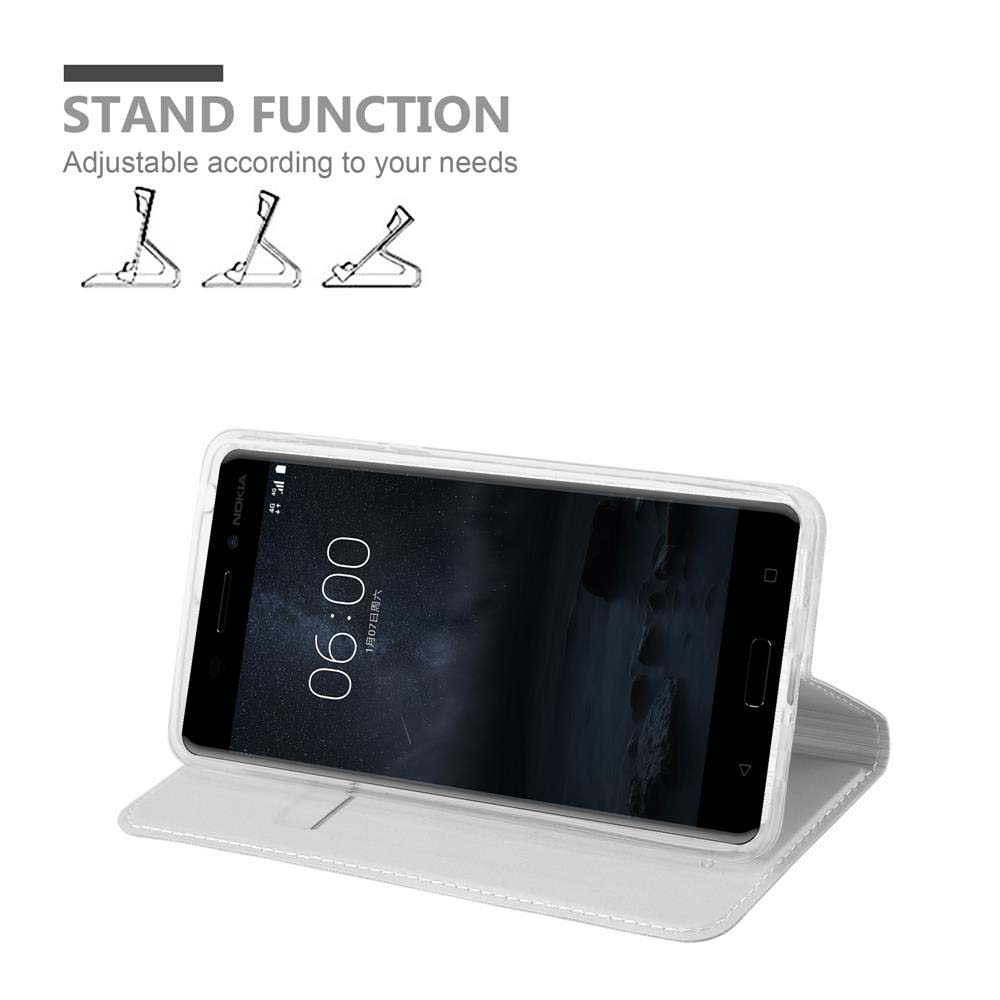 Ein weißes Handy in einer Hülle mit Ständerfunktion und der Uhrzeit 06:00.