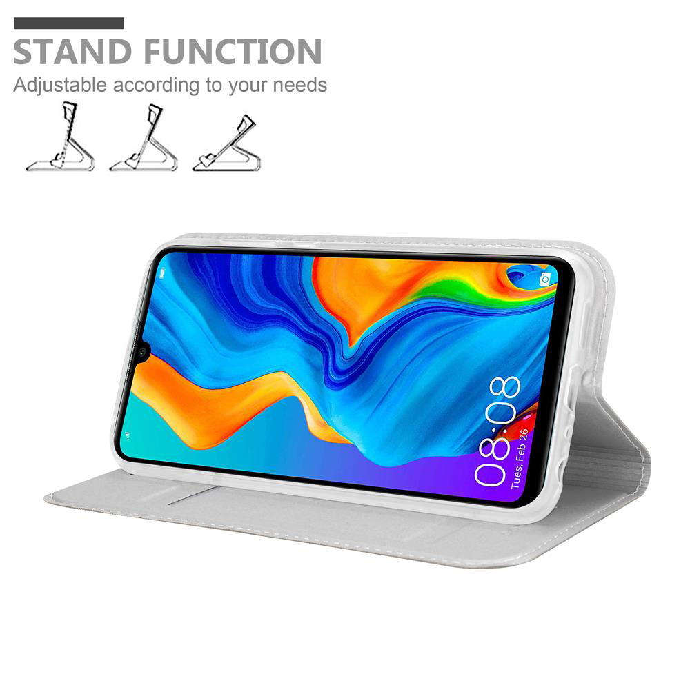 Uno smartphone bianco in una custodia che funge da supporto.