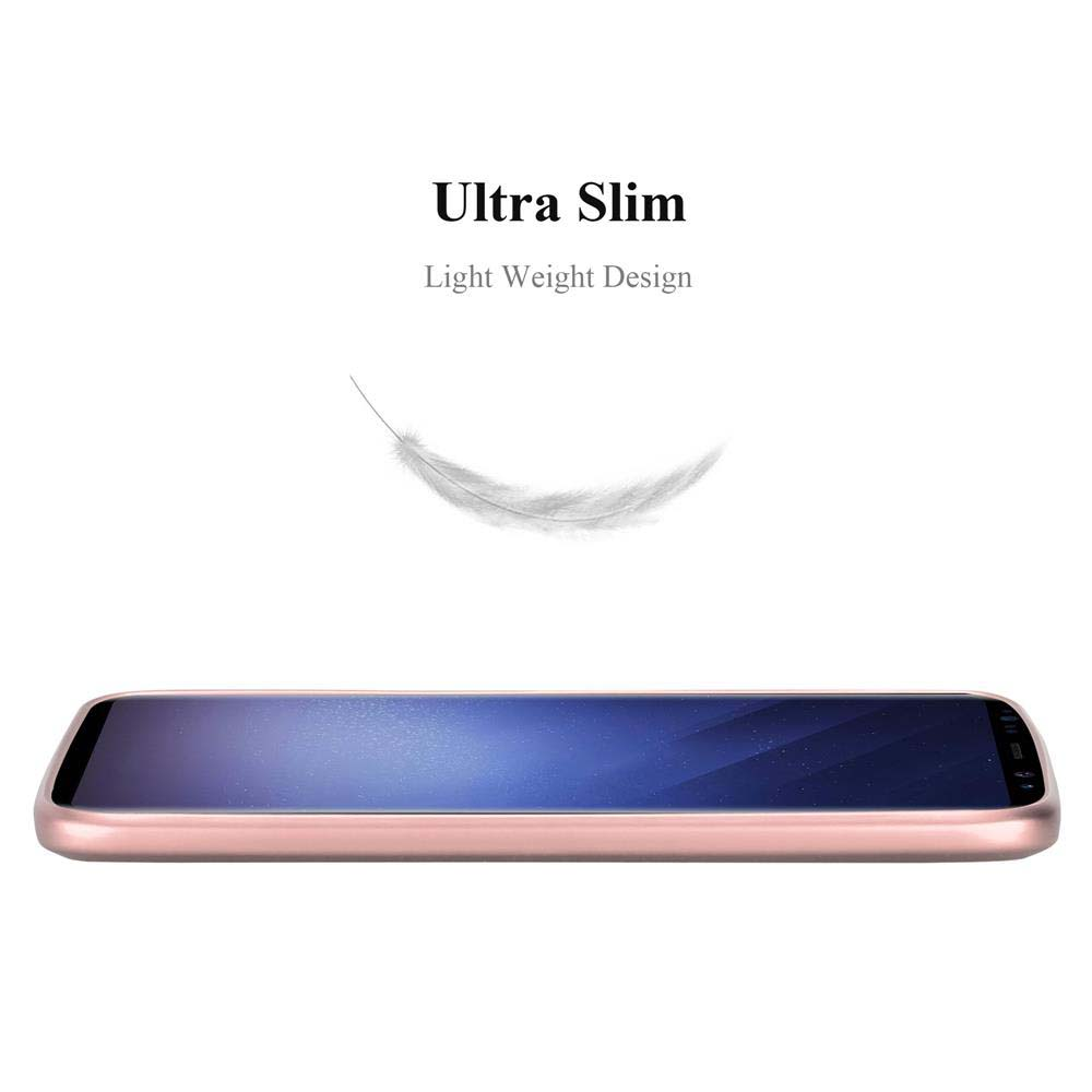 Uno smartphone color oro rosa giace piatto, con una piuma che fluttua sopra.