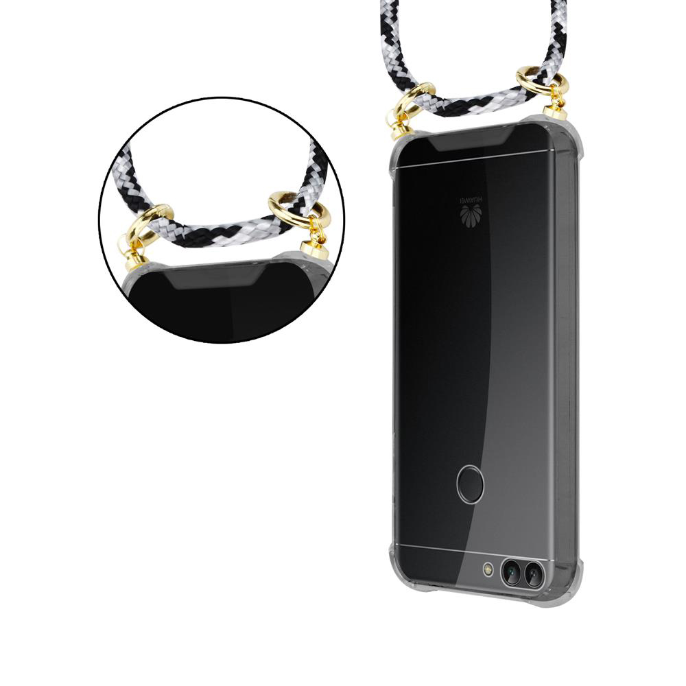 Uno smartphone nero in una custodia trasparente con un cordino fantasia.
