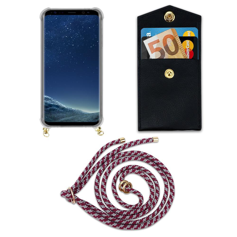 Uno smartphone in custodia, un portafoglio nero con carte e contanti, e un cordino.