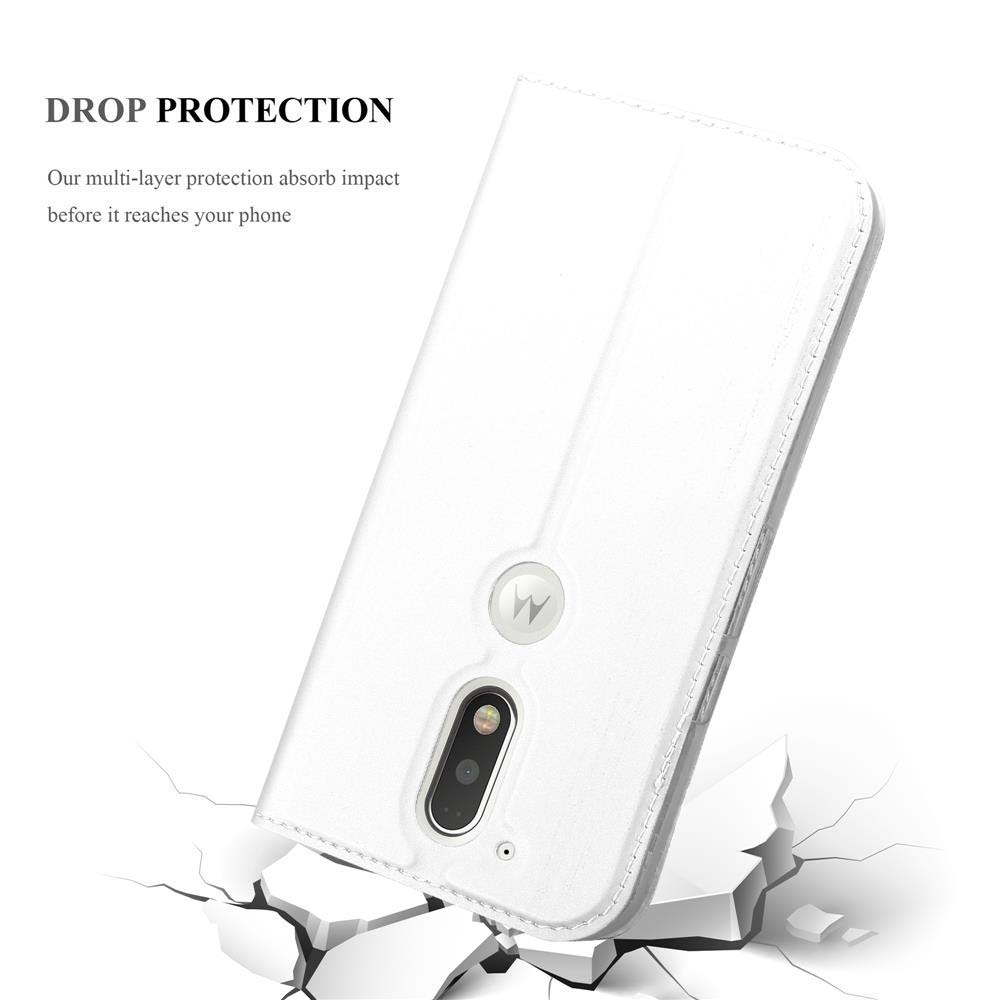 Funda blanca para teléfono con logo de Motorola cayendo sobre suelo agrietado.