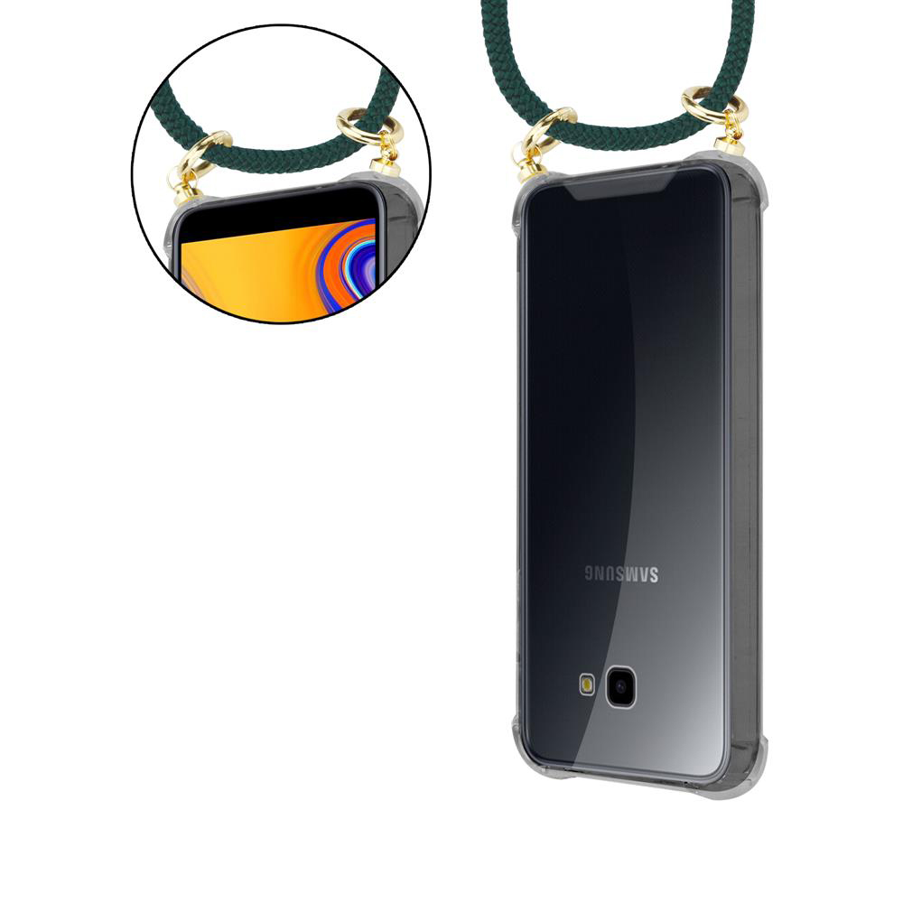 Un Samsung scuro in custodia trasparente con laccetto e dettagli dorati.
