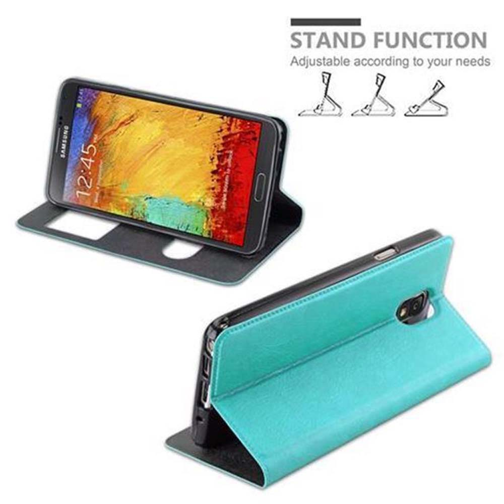 Un soporte de funda de teléfono turquesa mostrado en dos posiciones.