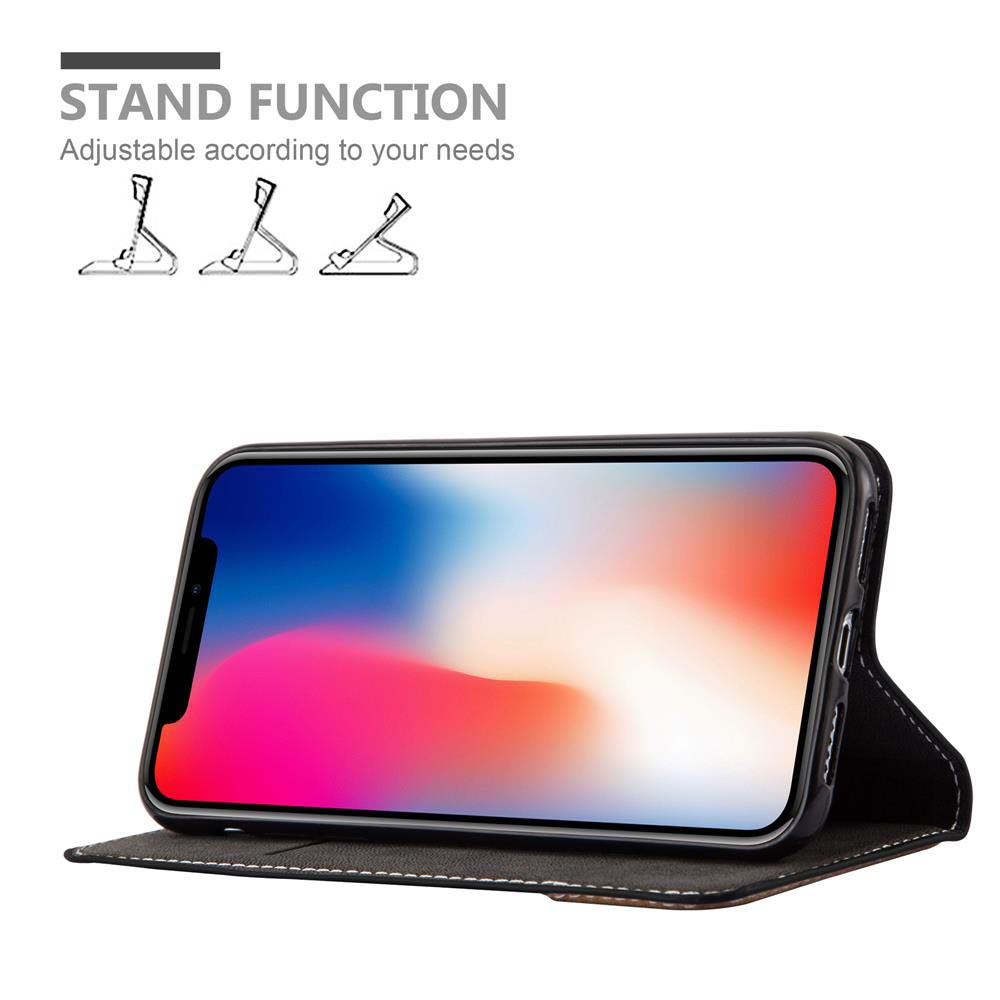 Ein Smartphone in einer schwarzen Hülle, die als Ständer dient.