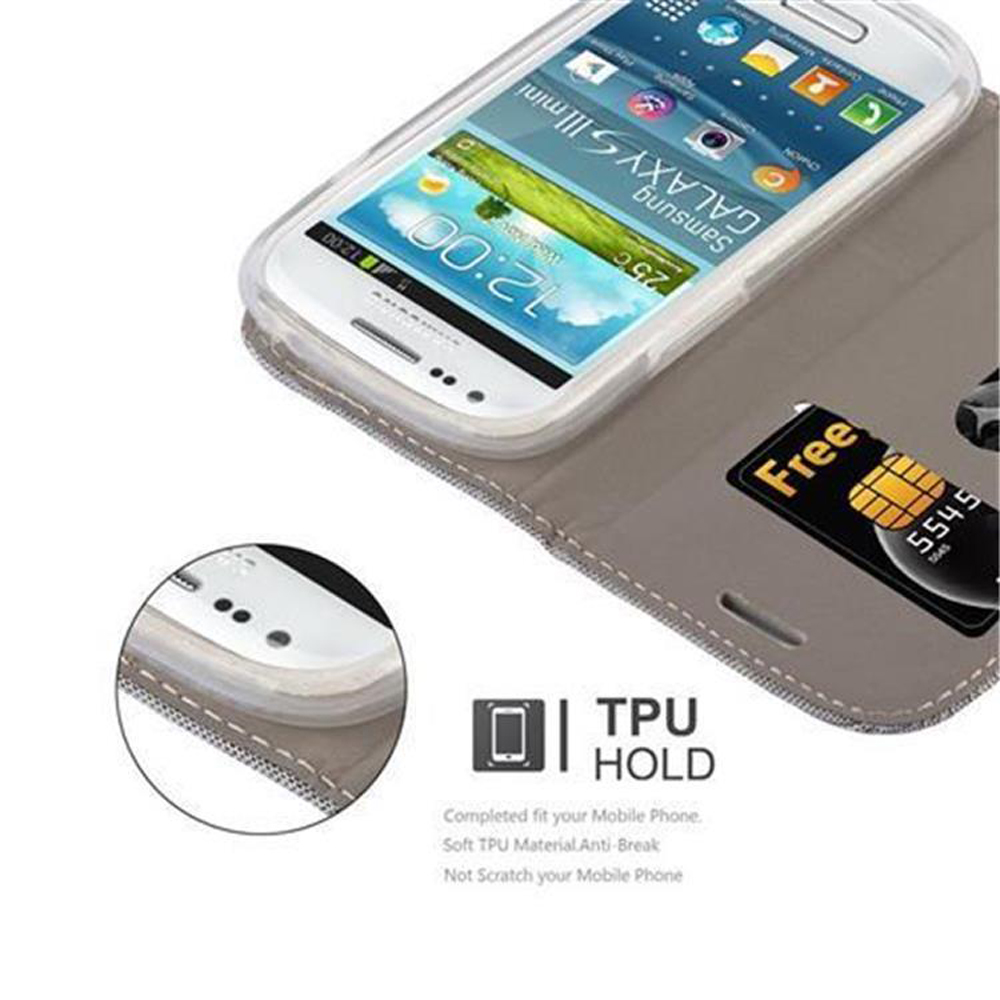Ein Samsung Galaxy S III Mini in einer grauen Hülle mit "Free" SIM-Karte.