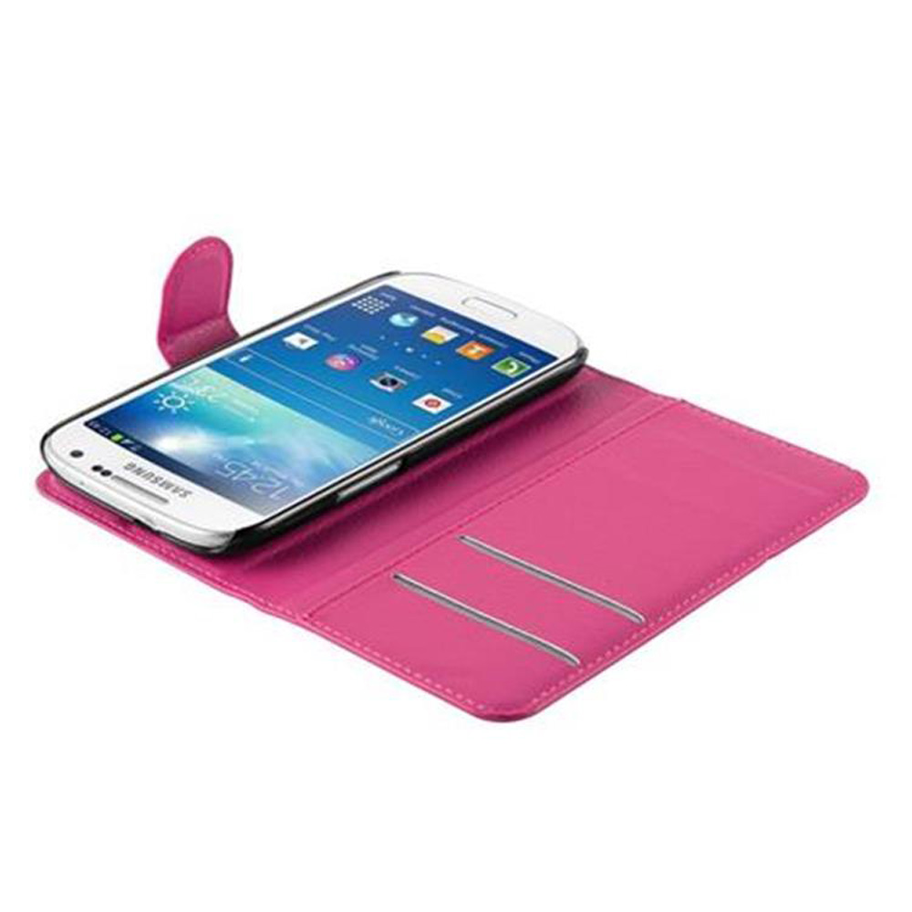 Una custodia rosa per telefono con uno smartphone bianco. Lo schermo mostra le 12:45.