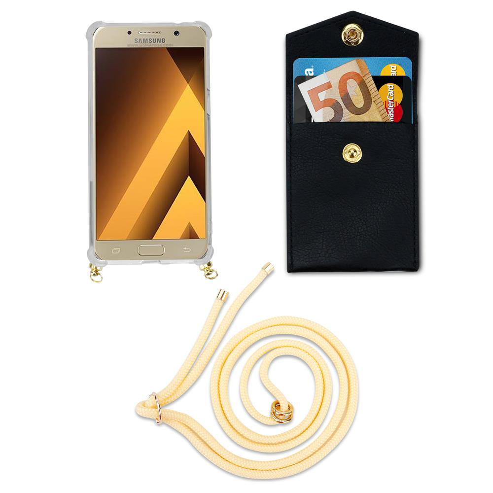 Custodia dorata Samsung con cinturino, portafoglio nero con soldi e carte.