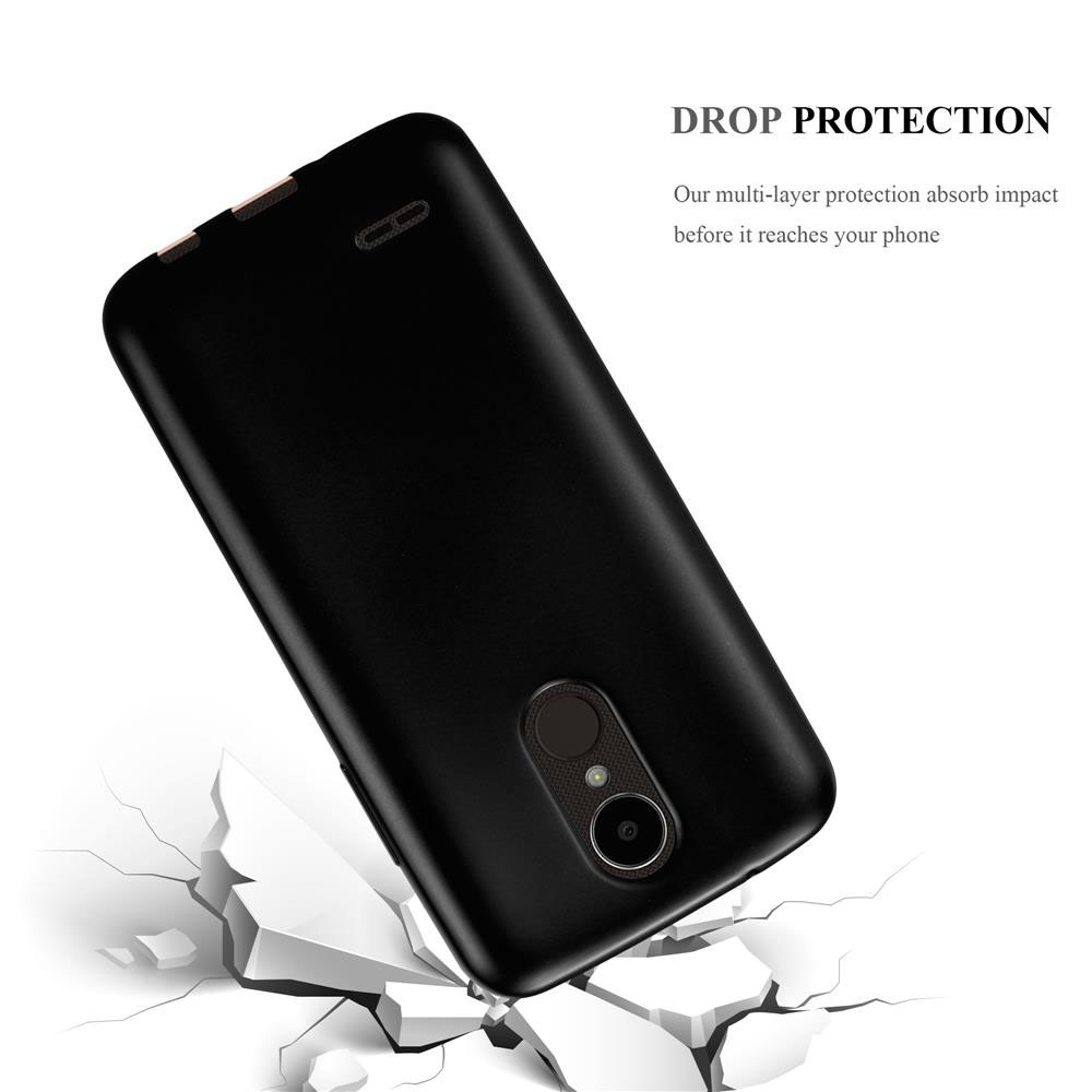 Funda negra para teléfono rompiendo superficie blanca, mostrando protección.