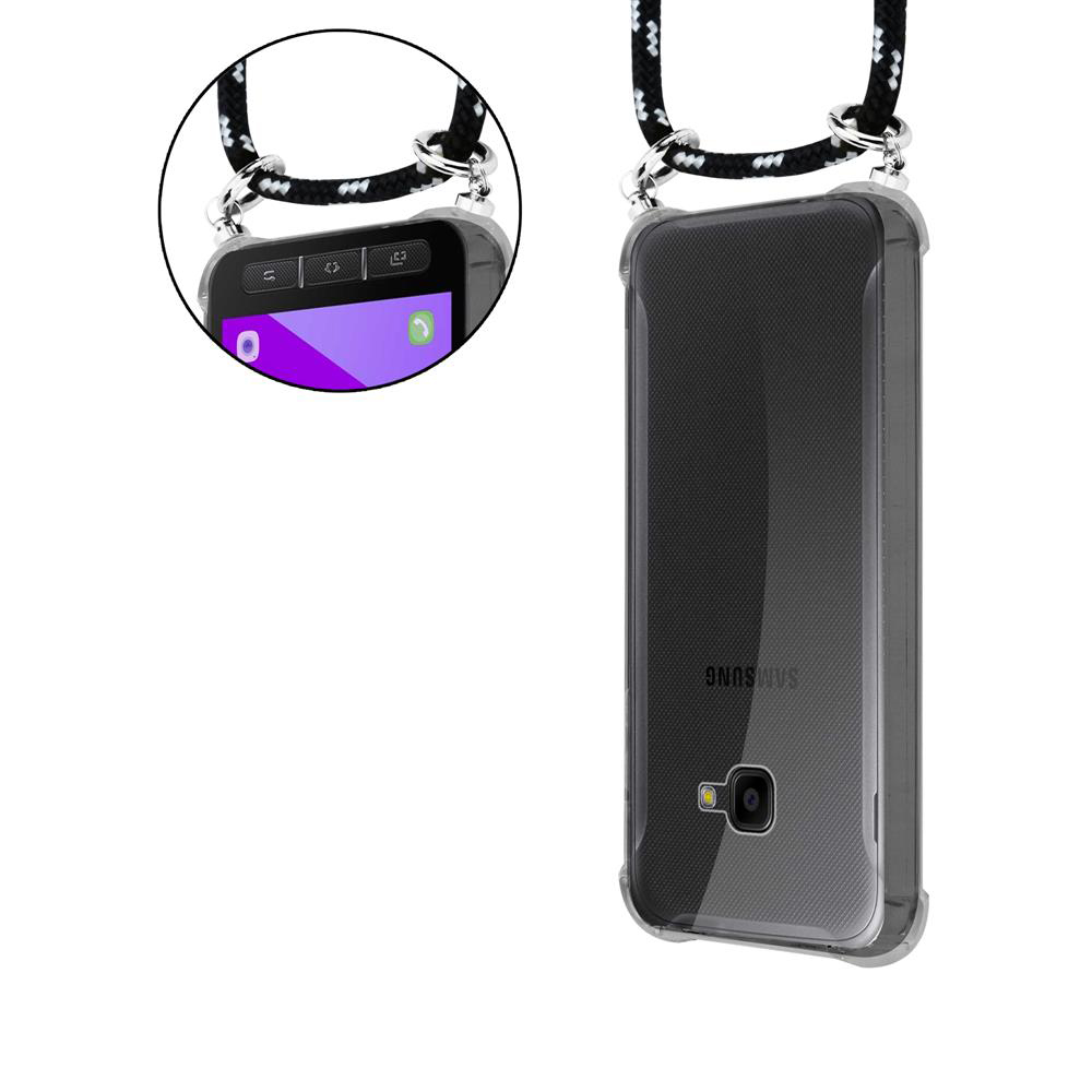 Una custodia trasparente Samsung con un laccetto appeso sopra.