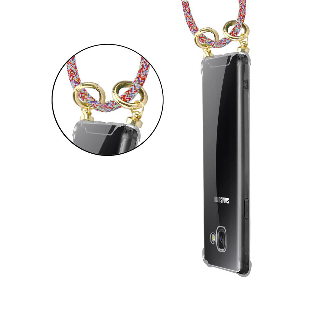 Un cordón de funda de teléfono transparente con cordones coloridos y anillos dorados.