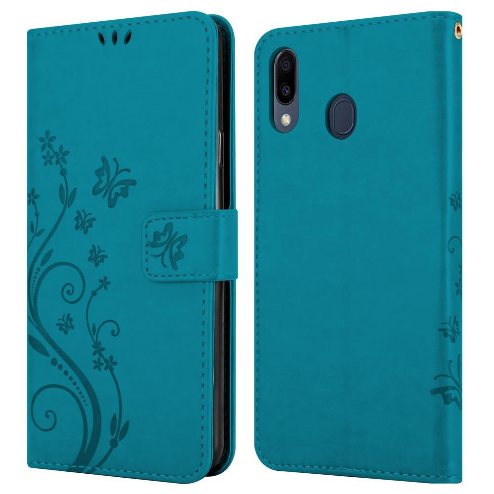 Custodia a libro turchese per telefono con motivo floreale e chiusura magnetica.