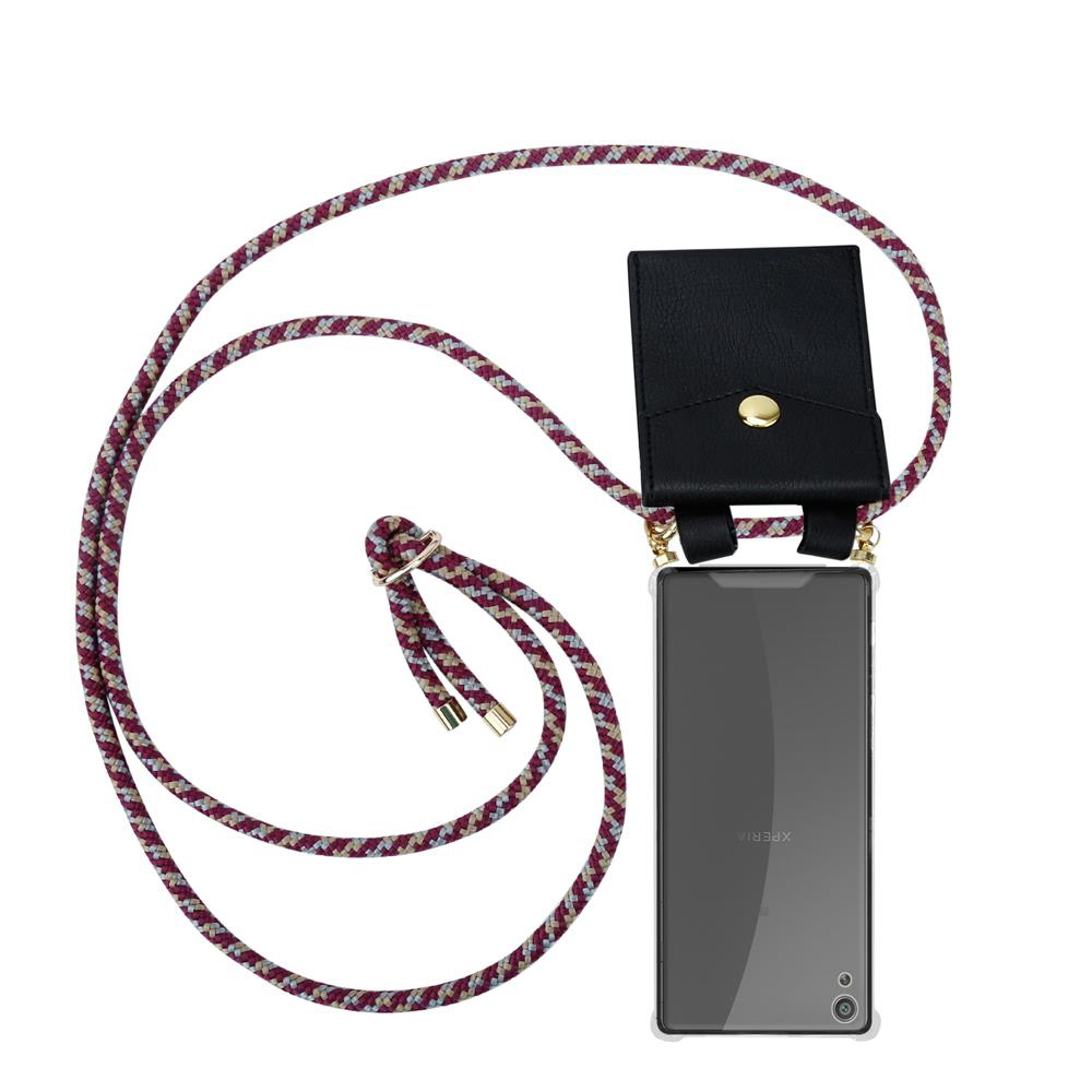 Schwarze Handyhülle mit Kordel zum Umhängen, goldener Knopf.