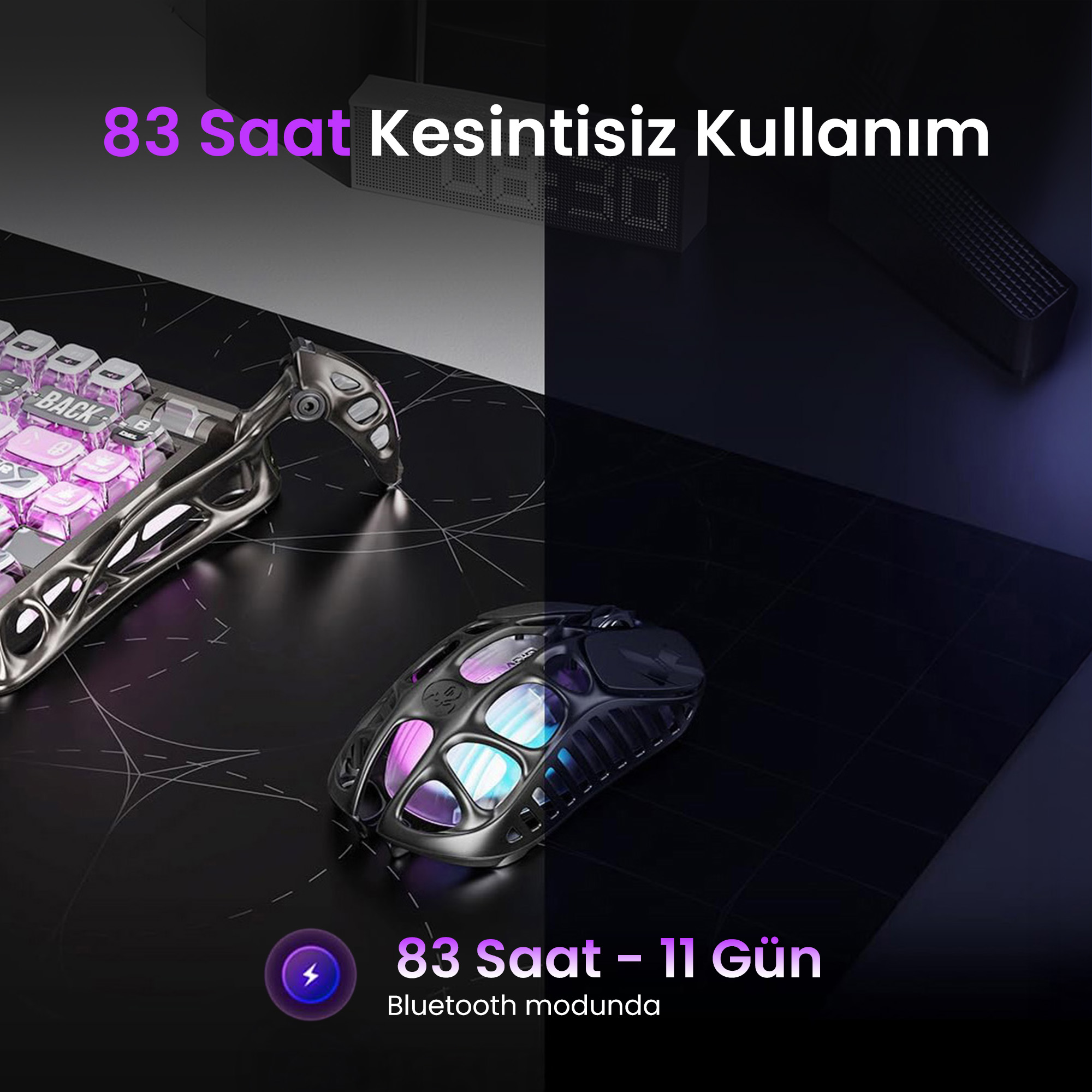 Mysz i klawiatura gamingowa z fioletowymi i niebieskimi światłami na ciemnym tle.