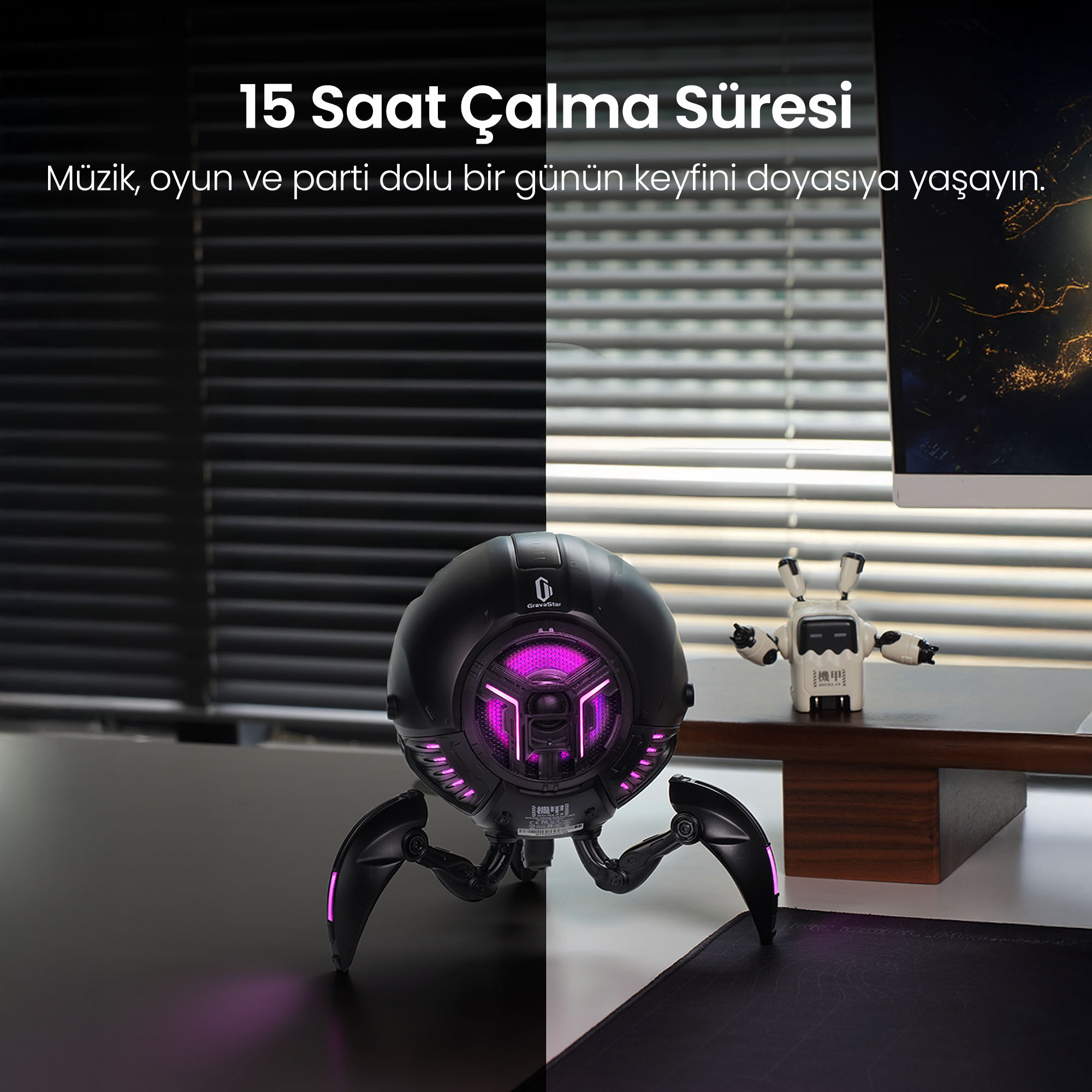 Mor ışıklı siyah hoparlör, küçük bir robotun yanında masada duruyor.
