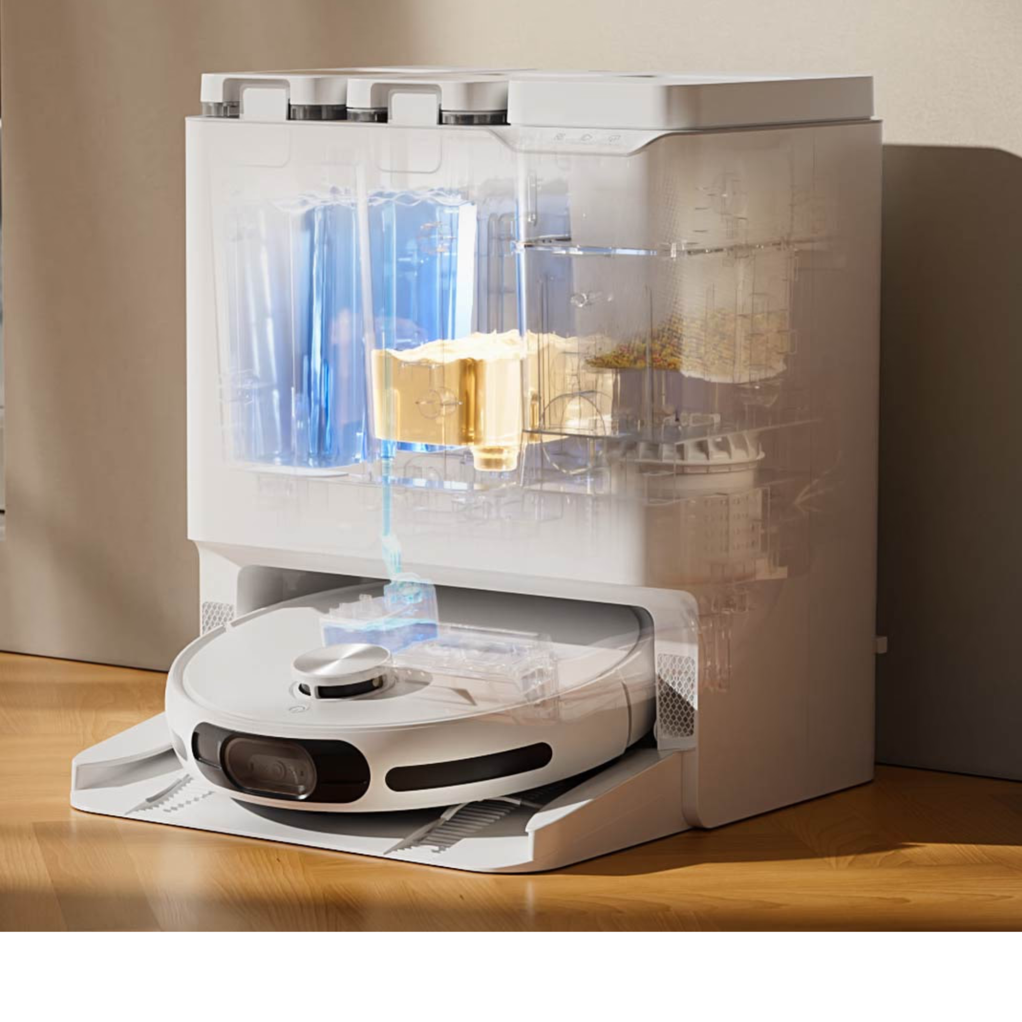 A white robot vacuum is in its charging station, which has clear containers.