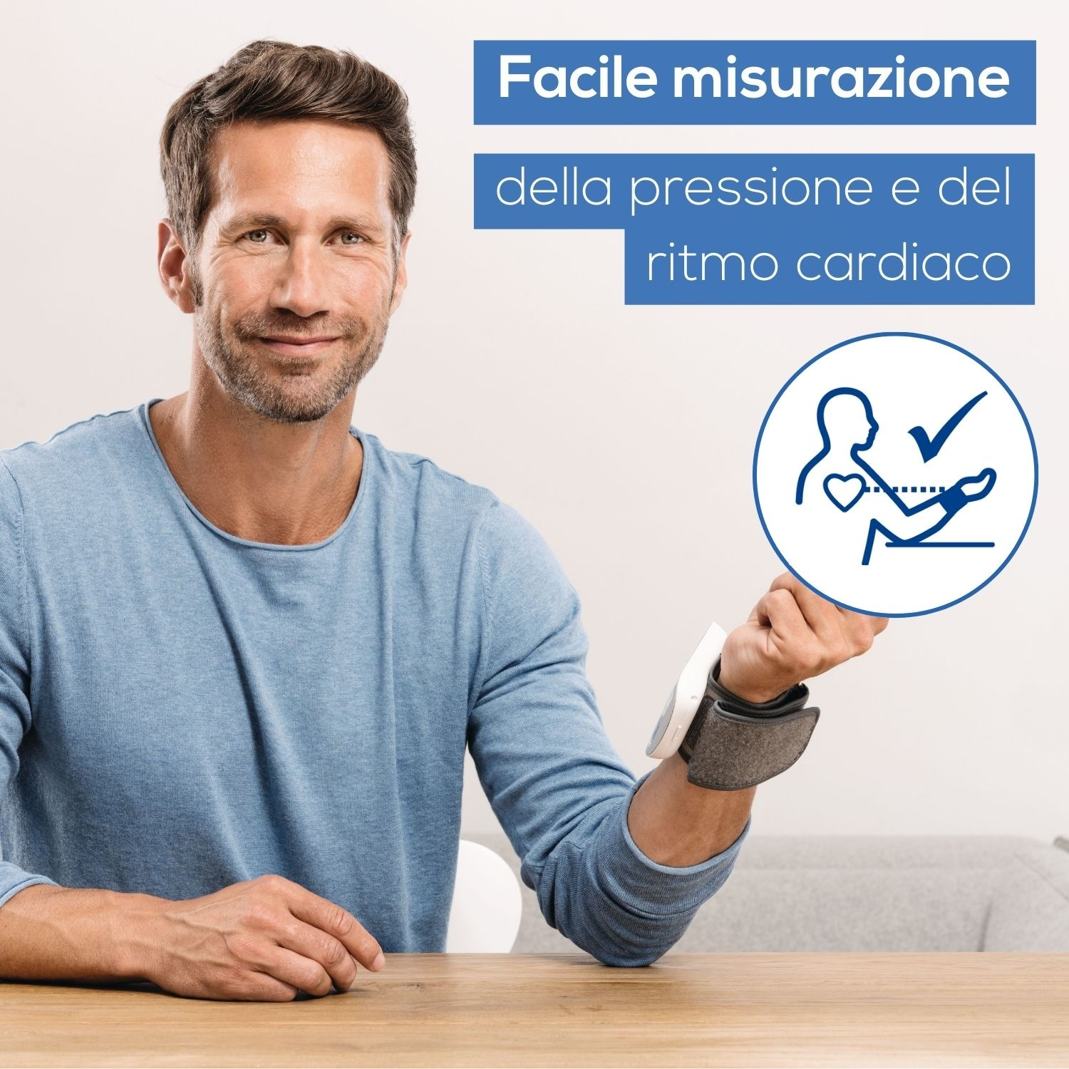 Mężczyzna z ciśnieniomierzem na nadgarstek i ikoną serca/ptaszka.