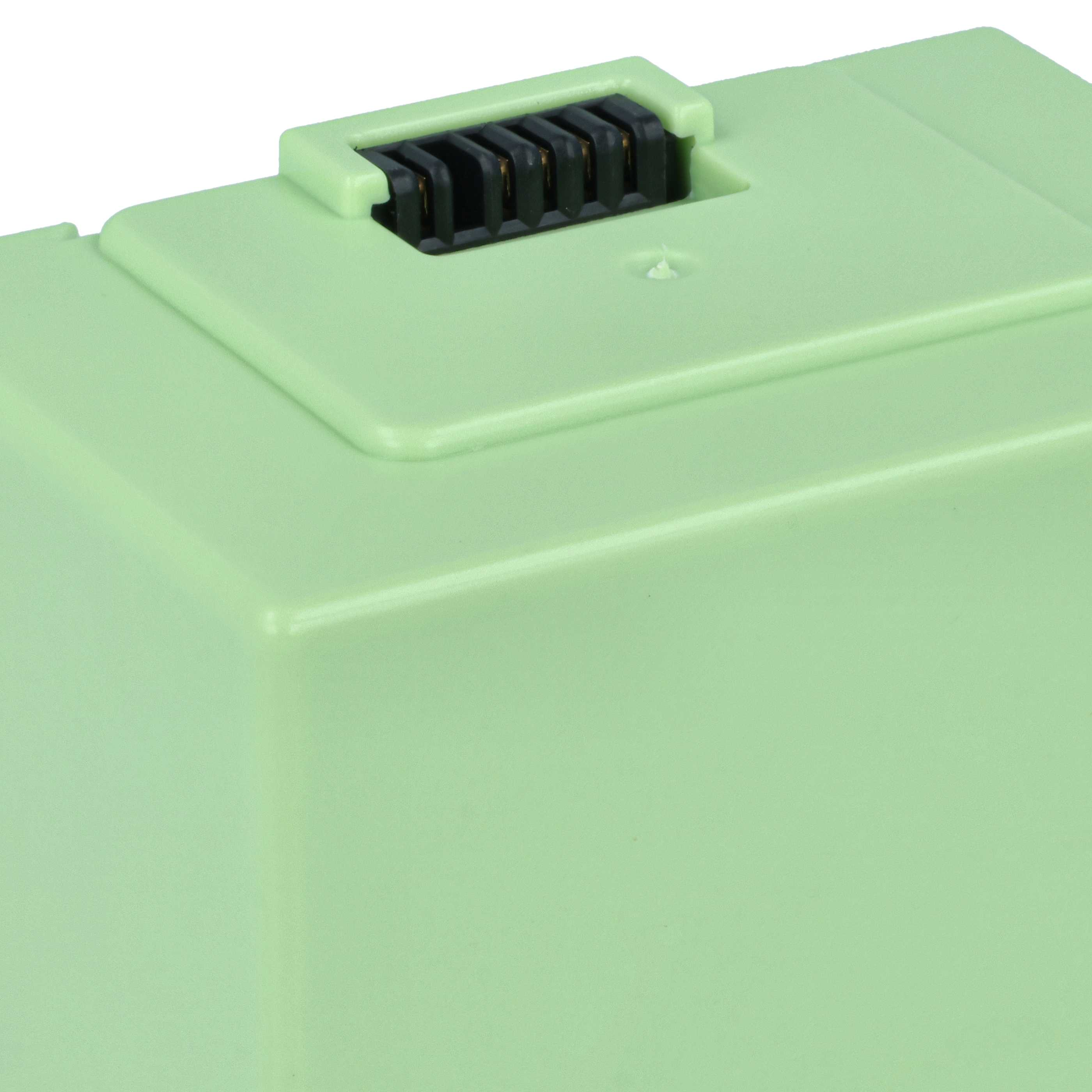 Nahaufnahme einer hellgrünen Plastikbox mit einem schwarzen Anschluss.