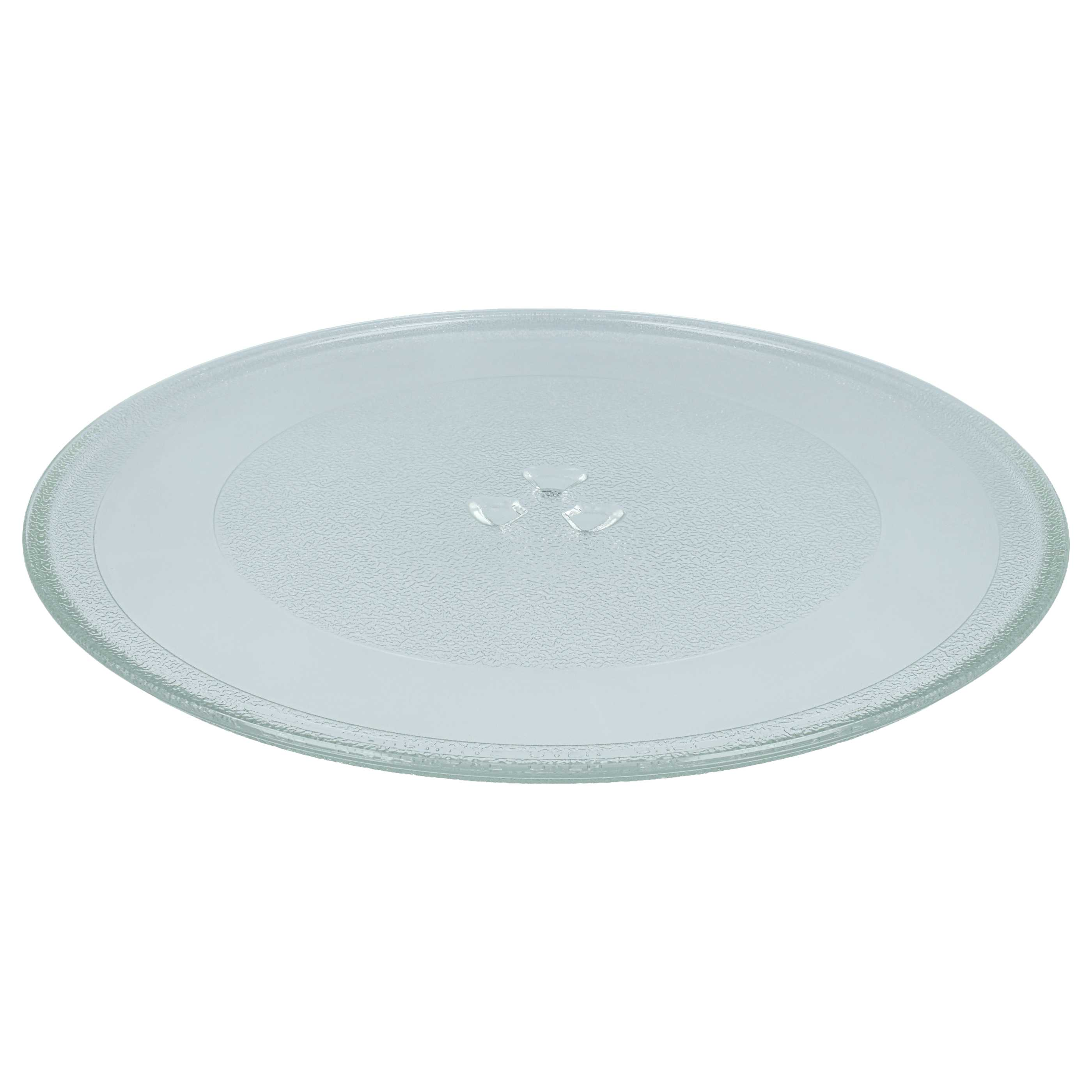 Eine transparente Glasplatte mit einem strukturierten Rand und drei Tropfen.