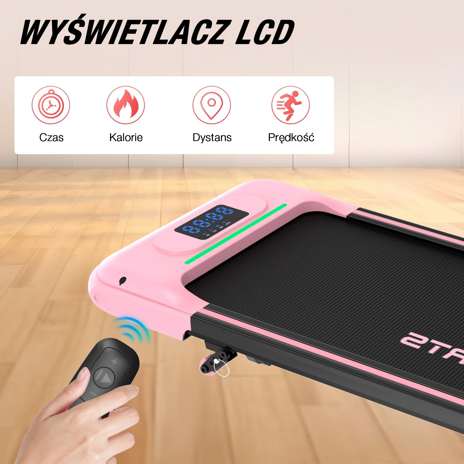 Różowa bieżnia z pilotem i ekranem LCD pokazującym ikony czasu, kalorii, dystansu i prędkości.