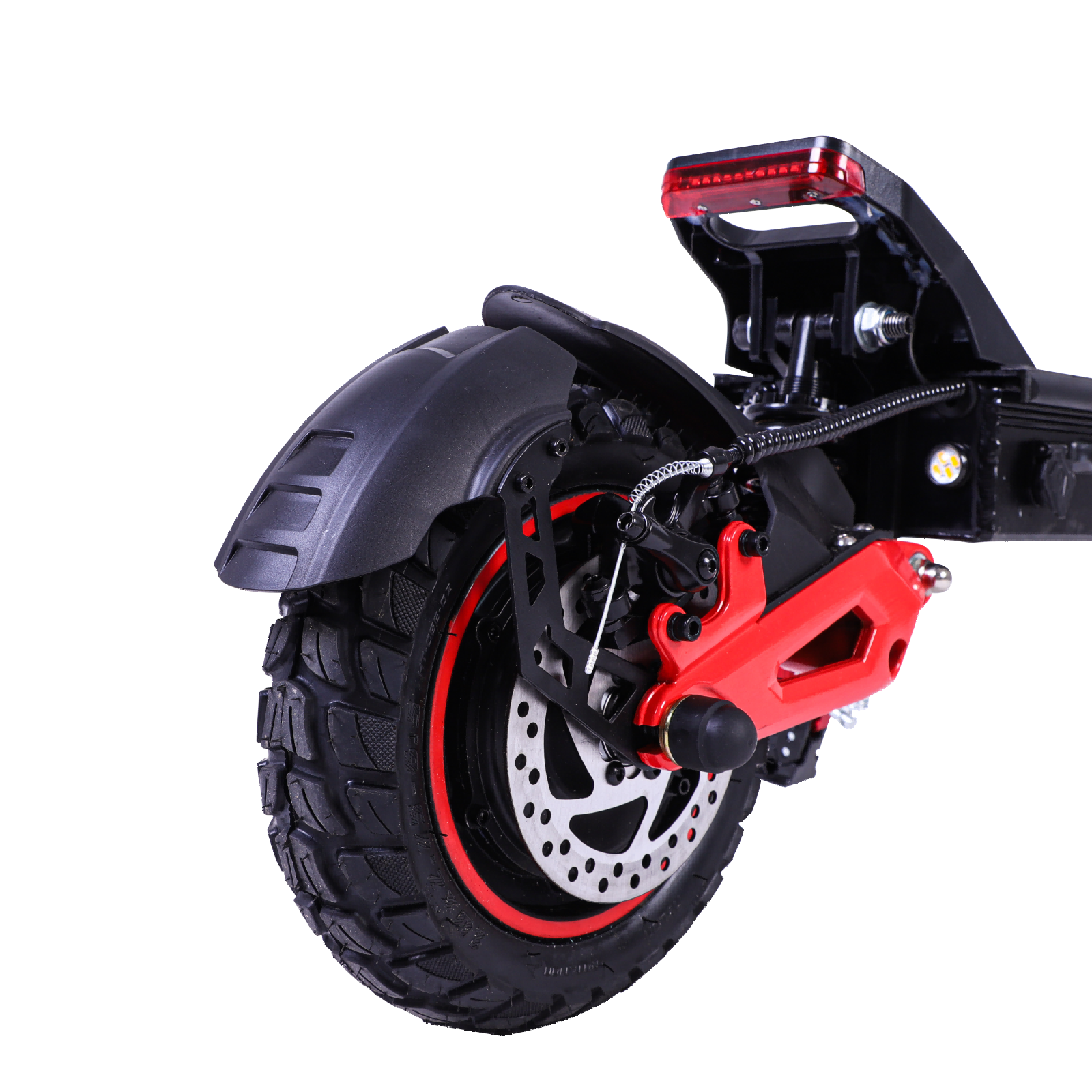 Zbliżenie tylnego koła, hamulca i tylnego światła hulajnogi elektrycznej.