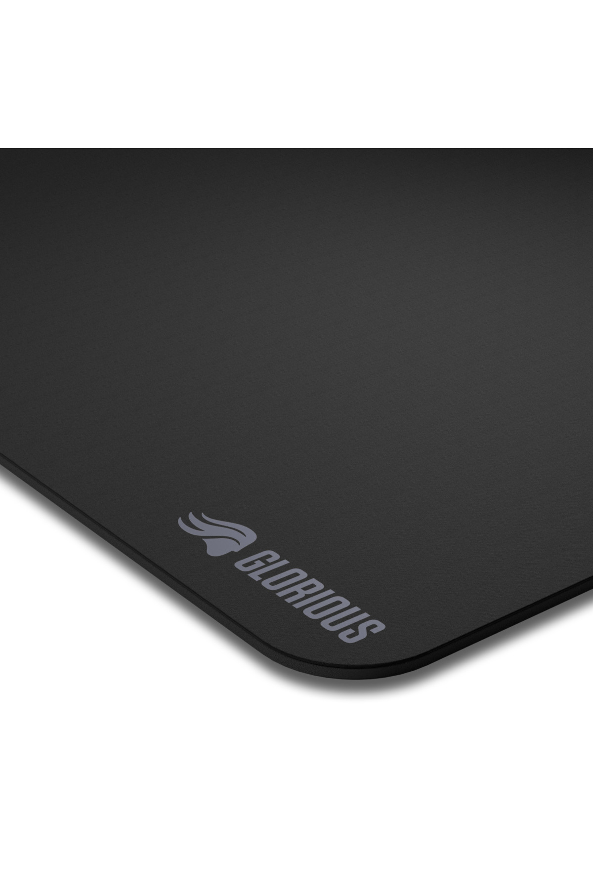 Gri "Glorious" logolu siyah mousepad, yakın çekim.