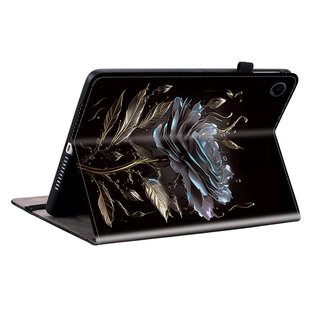 Ein schwarzes Tablet mit einer stilisierten Rose und Blattmuster.
