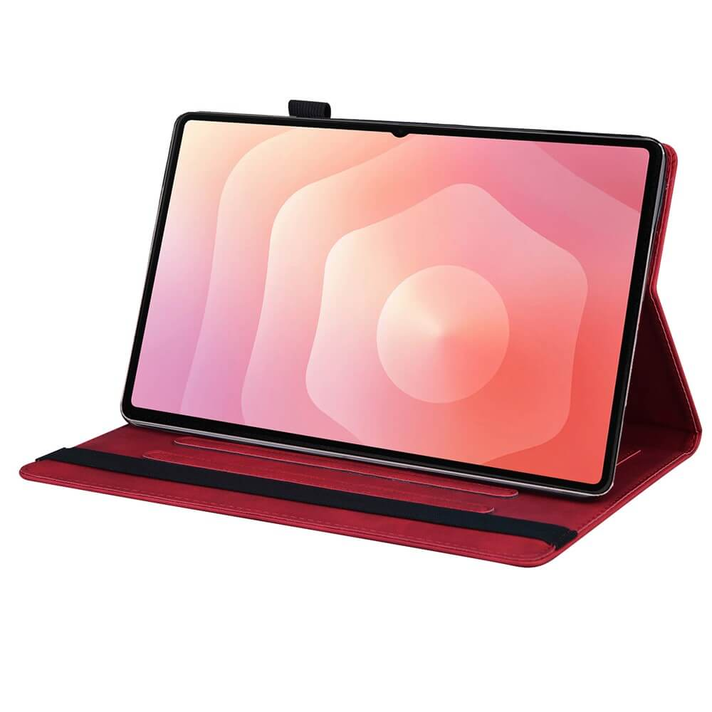 Ein rotes Tablet in einer Hülle mit einem abstrakten Muster auf dem Bildschirm.