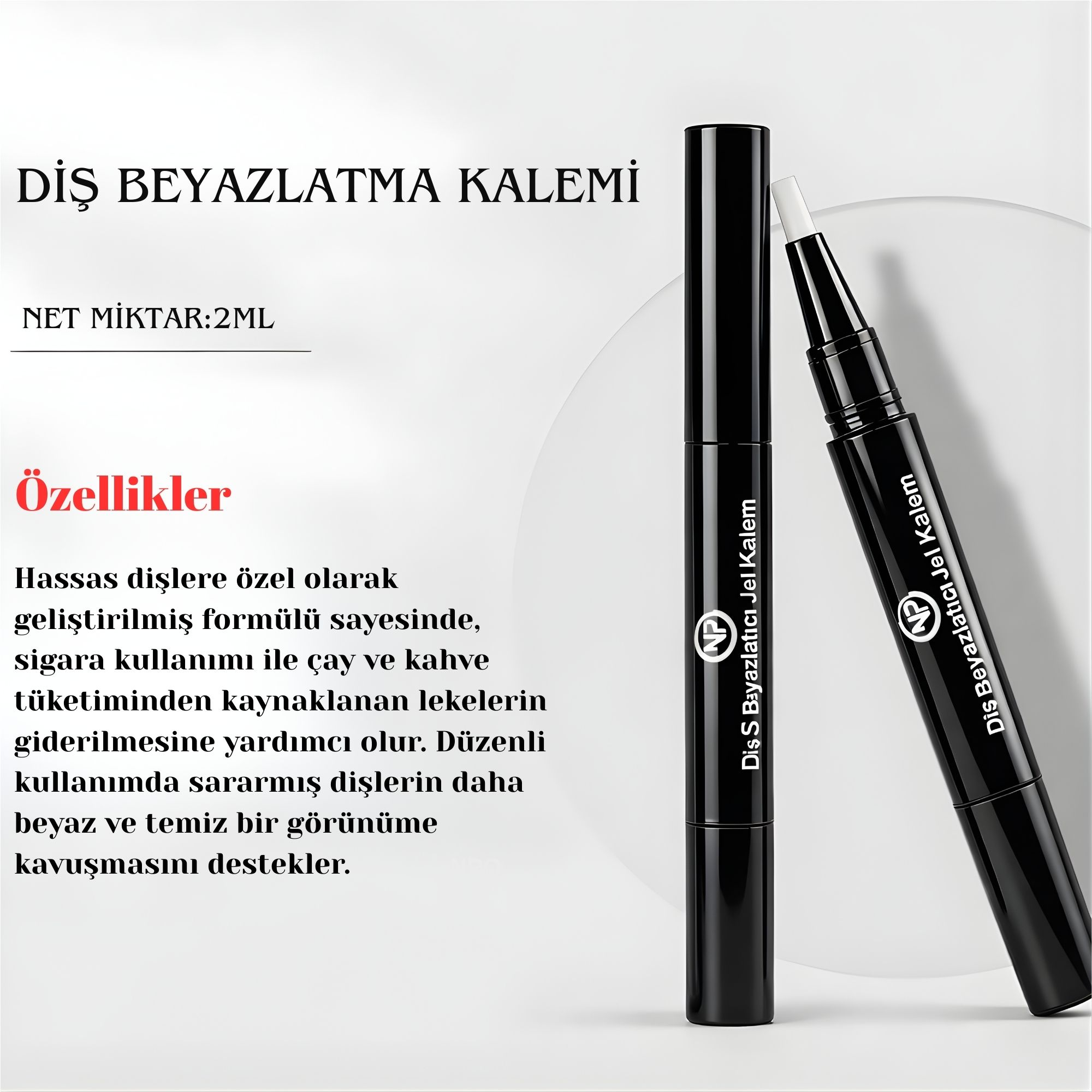 Açık bir kalemin yanında siyah bir diş beyazlatma kalemi.