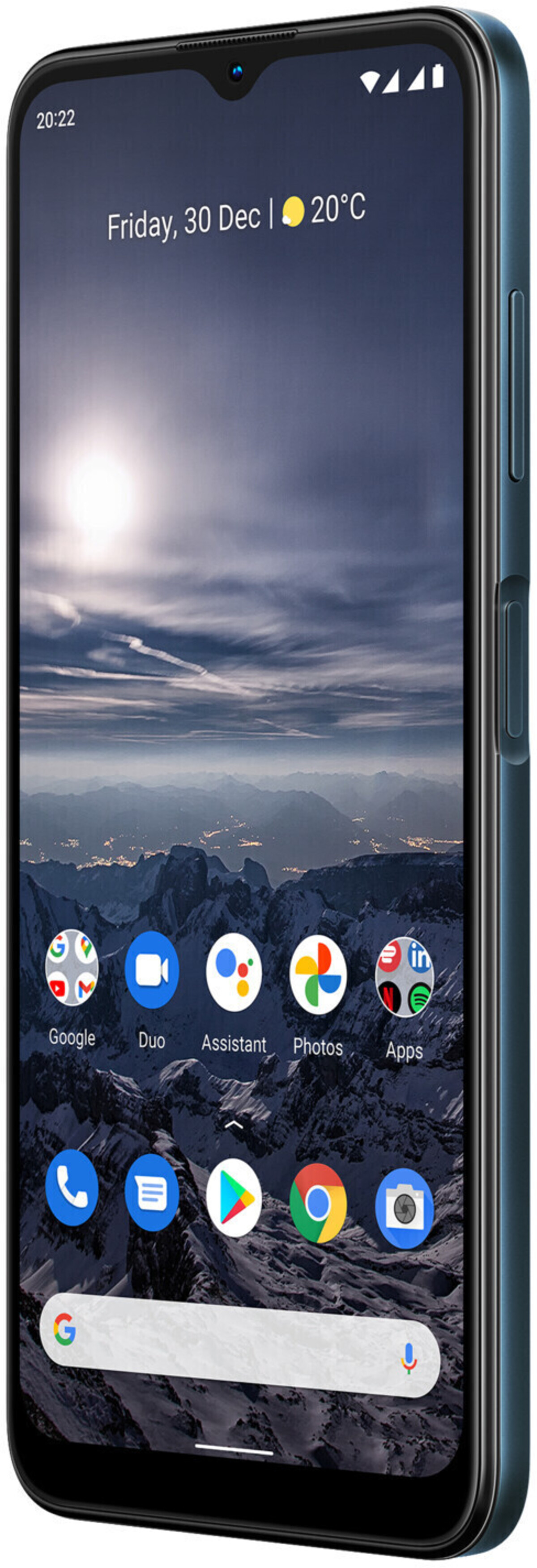Smartphone mit Berglandschaft als Hintergrund, Apps und Suchleiste.