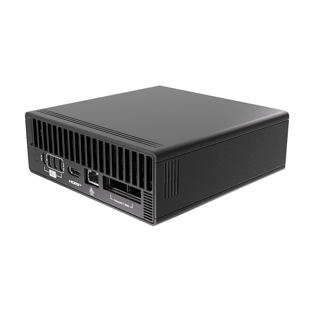 A black mini PC with ventilation slots and ports including HDMI.