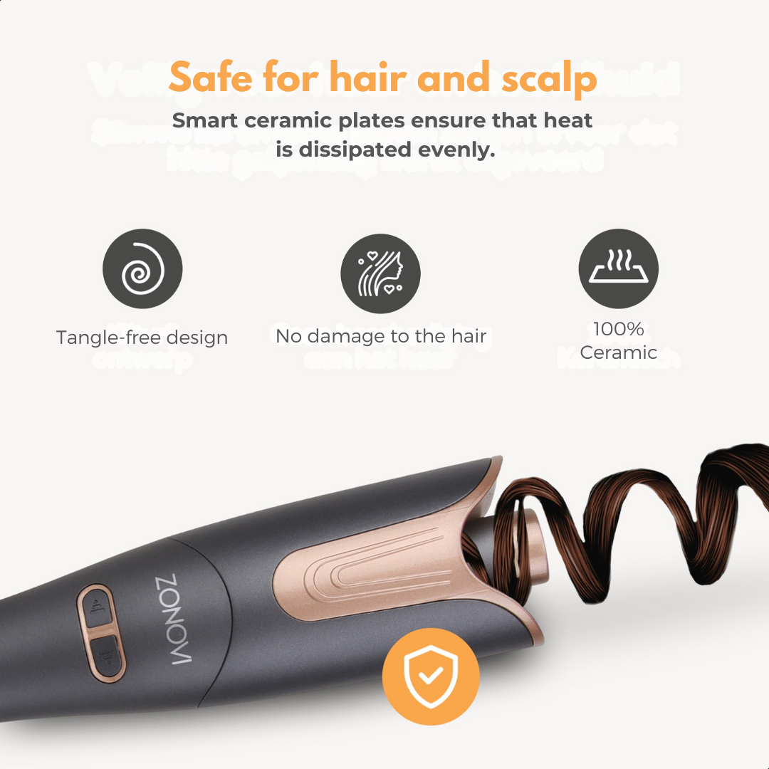 A dark hair curler with gold accents and wavy hair.