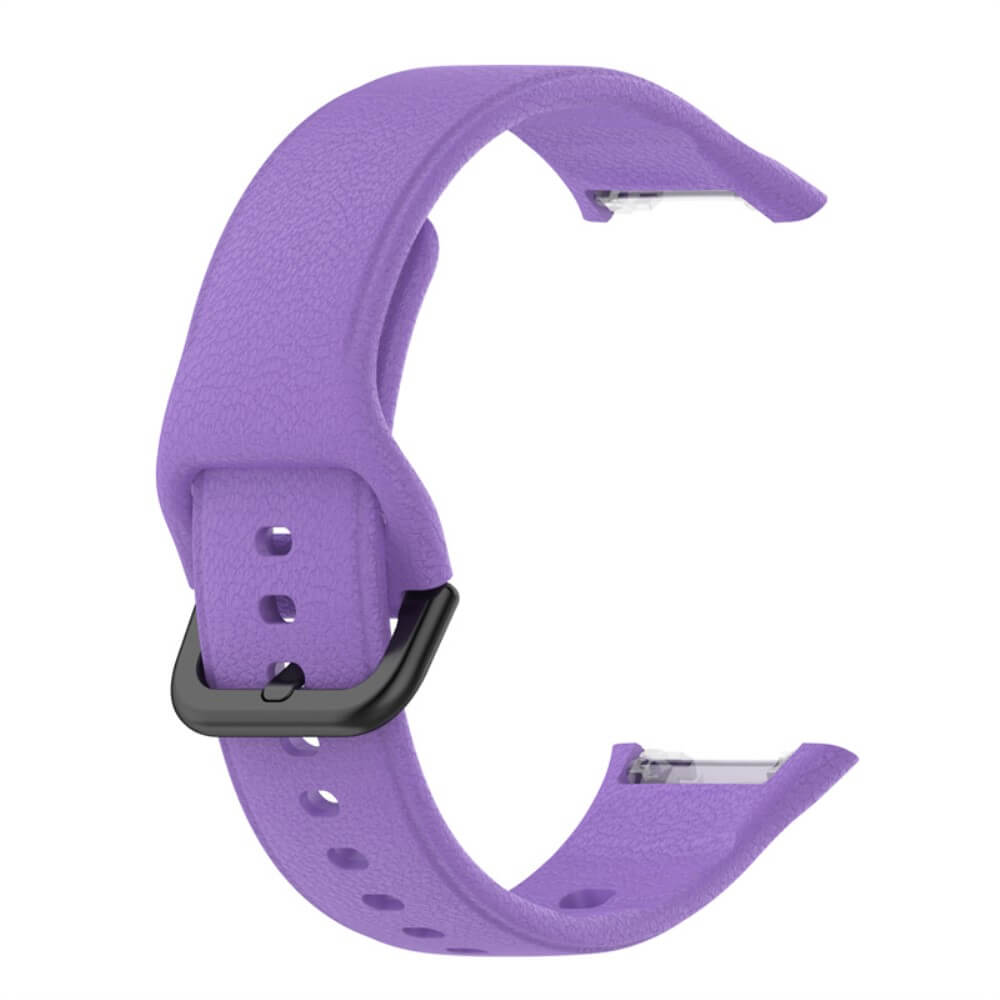 Un bracelet de montre violet avec une boucle noire et plusieurs trous.