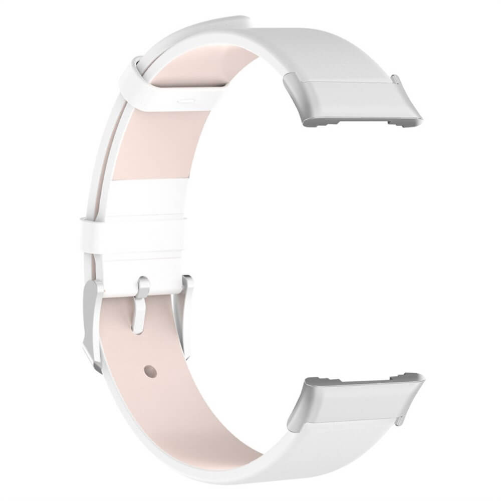 Un bracelet de montre blanc avec doublure intérieure rose pâle et boucle métallique.