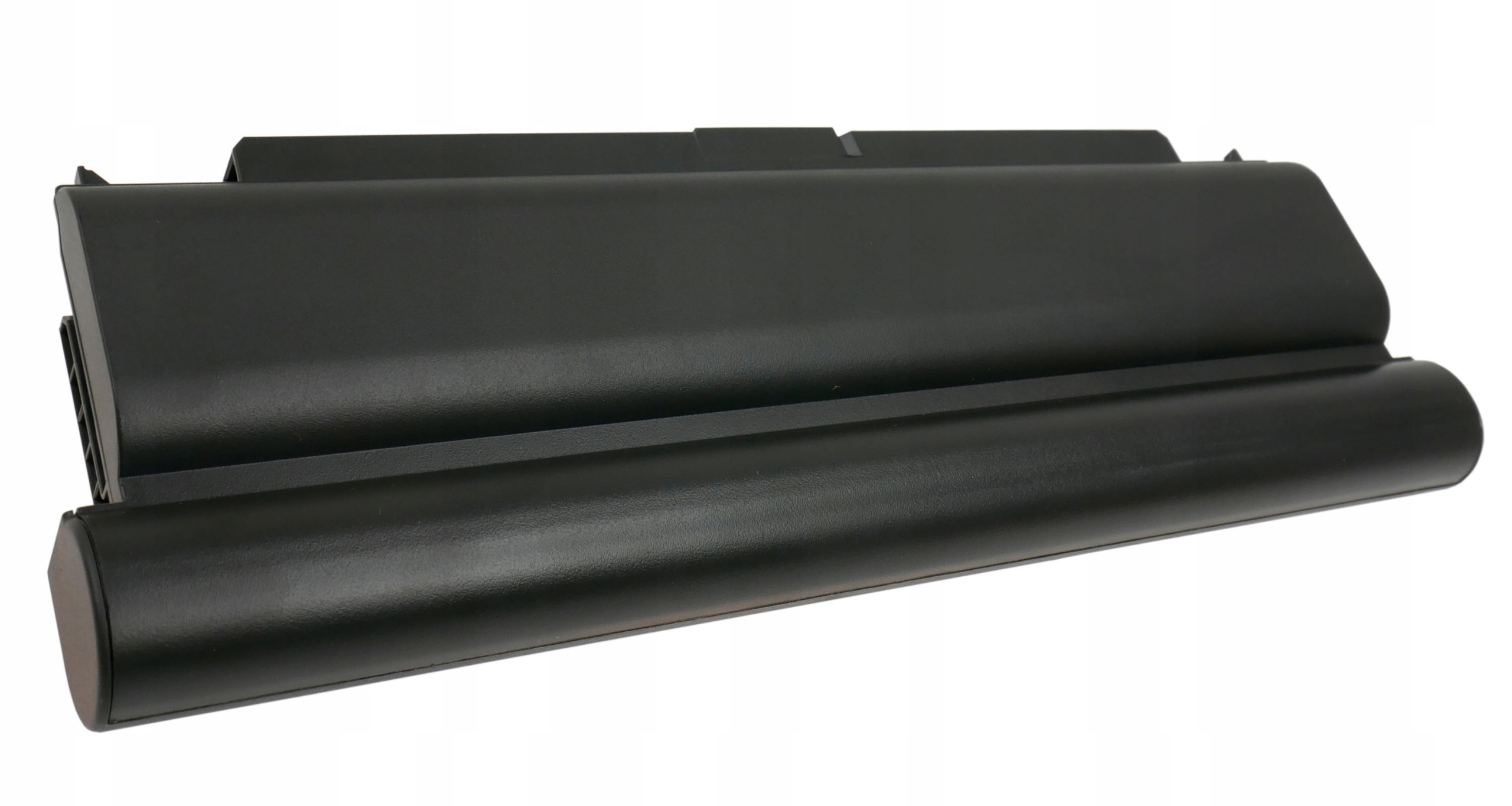 Czarna bateria do laptopa na białym tle.