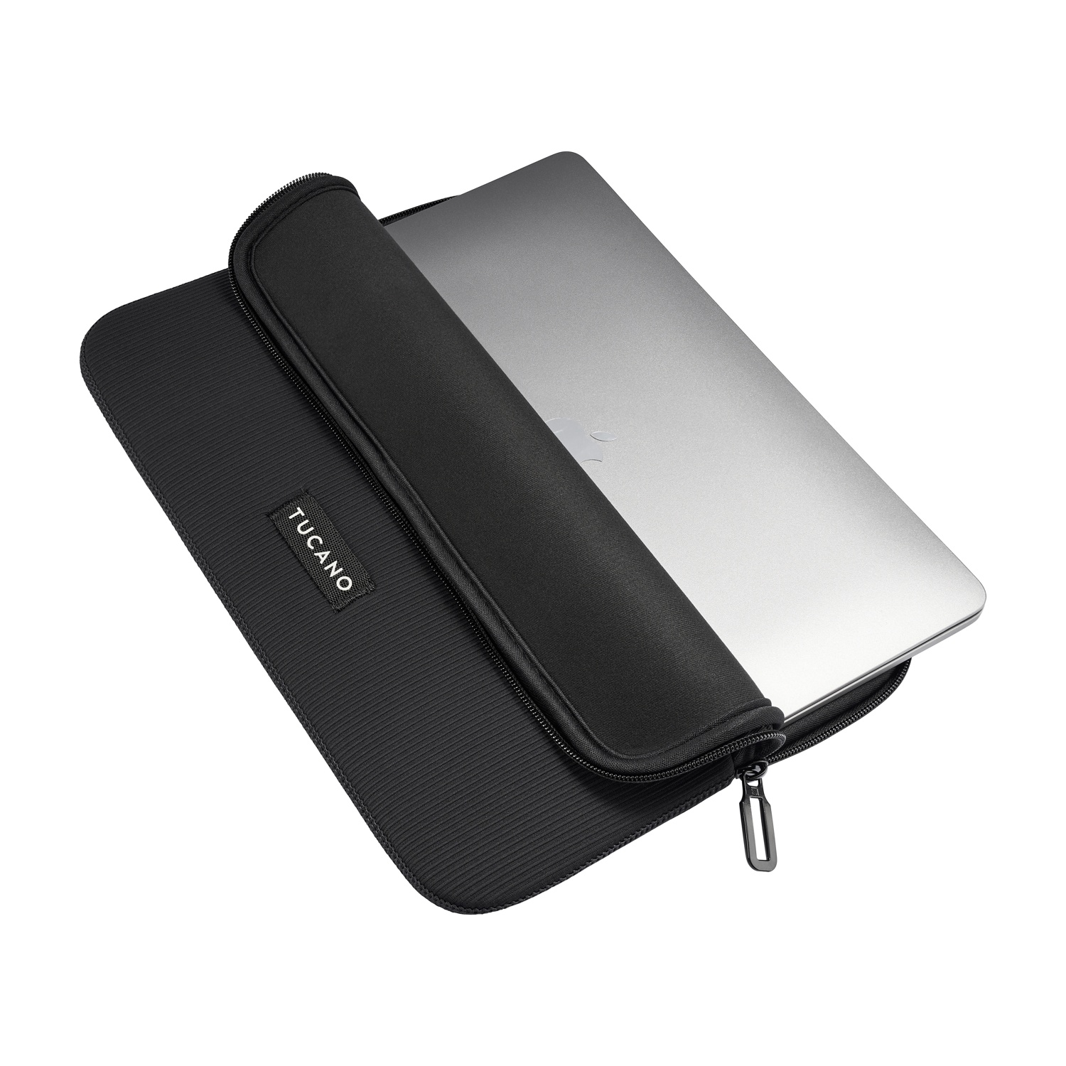 A silver laptop is partially inserted into a black Tucano laptop sleeve.